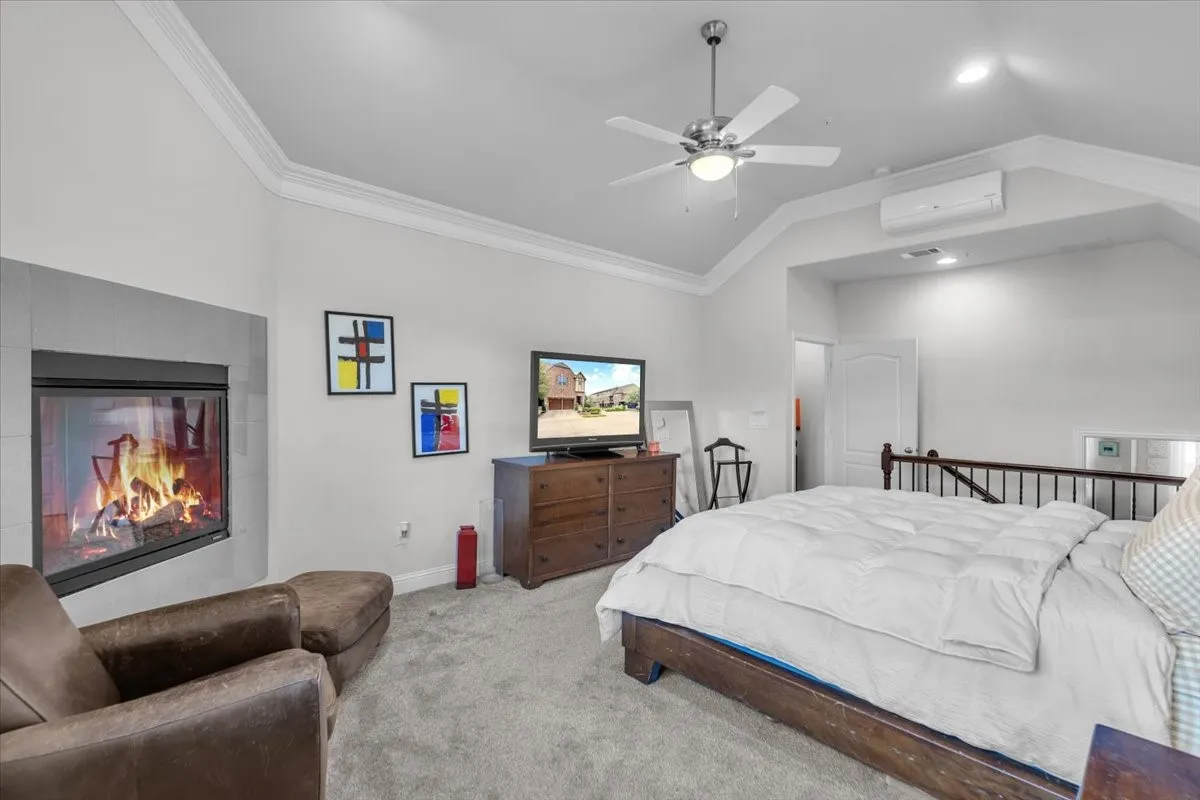 Large primary bedroom and private retreat featuring an LG mini-split air conditioning system for extra comfort and convenience.