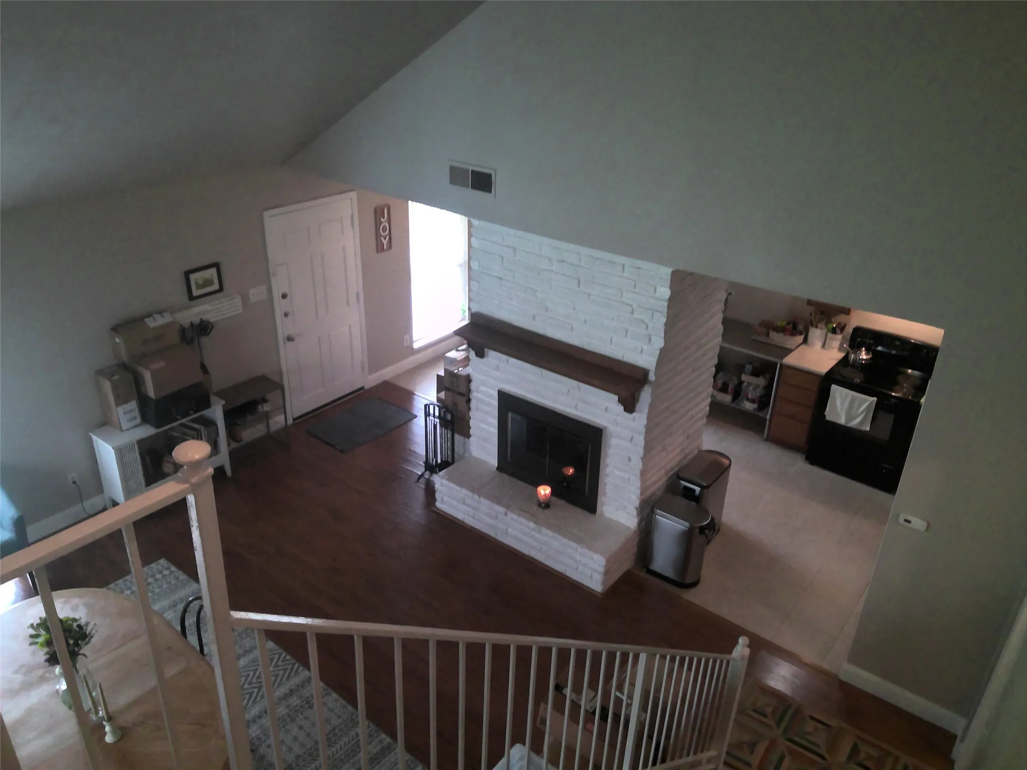 Vaulted den ceiling. Upstairs has 2 large bedrooms and a full bath.