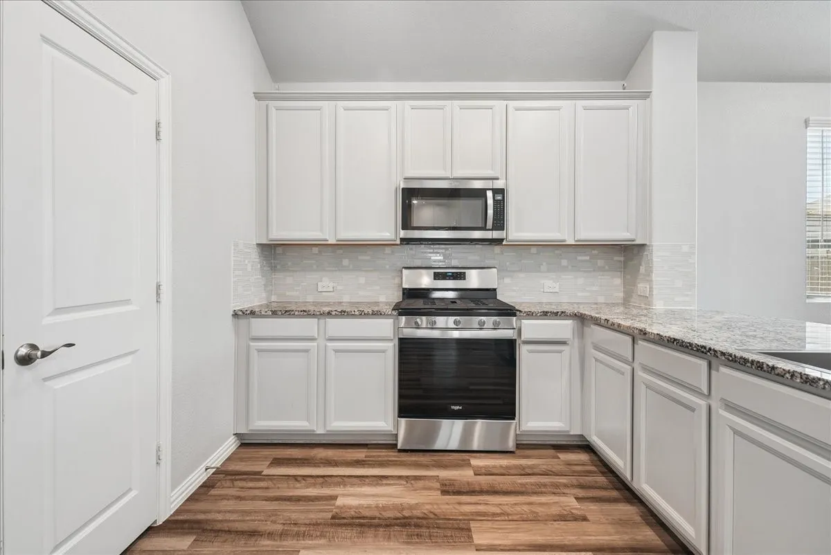 view of kitchen and pantry door to the right
