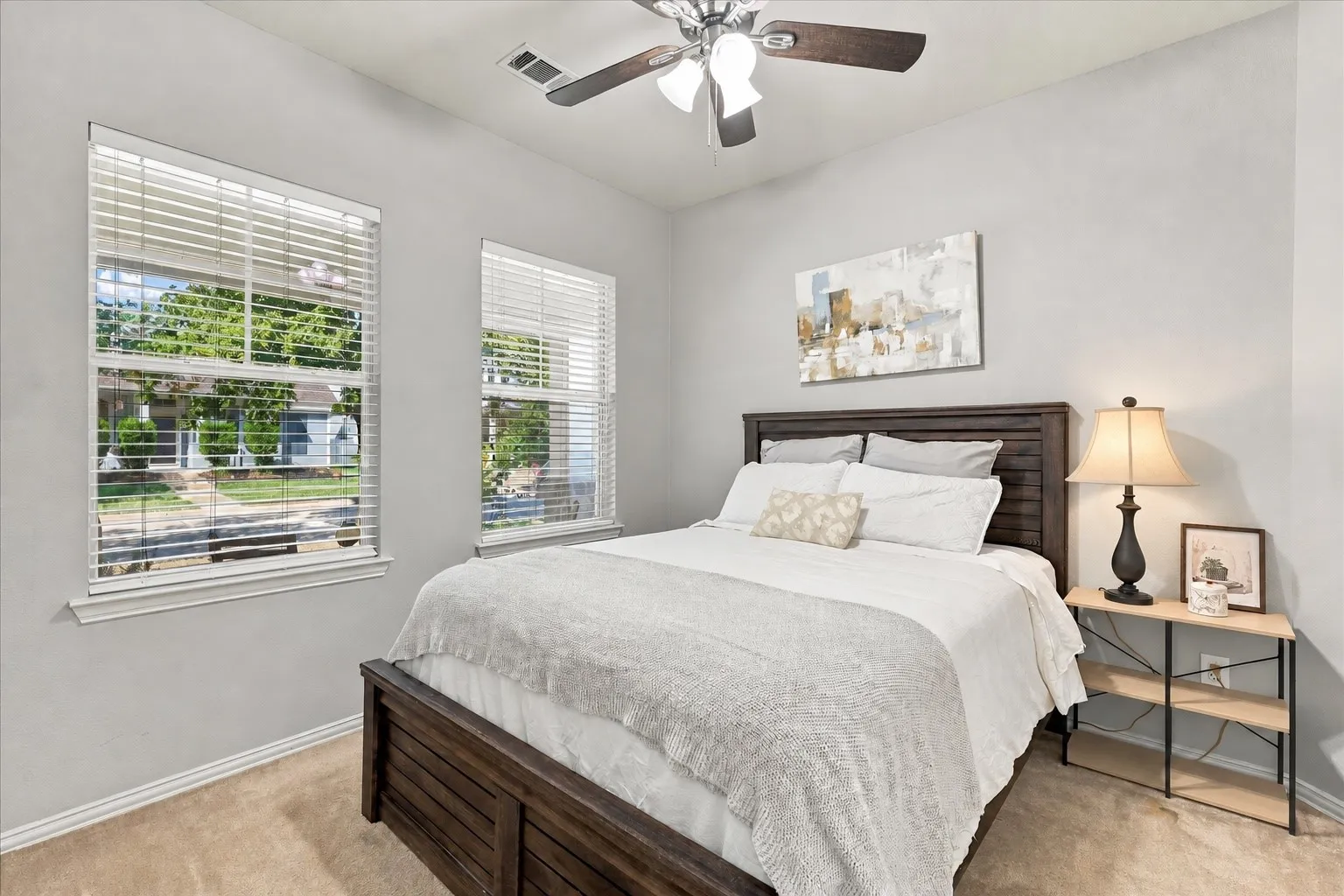 Secondary bedroom off the first level with split bathroom and natural light!