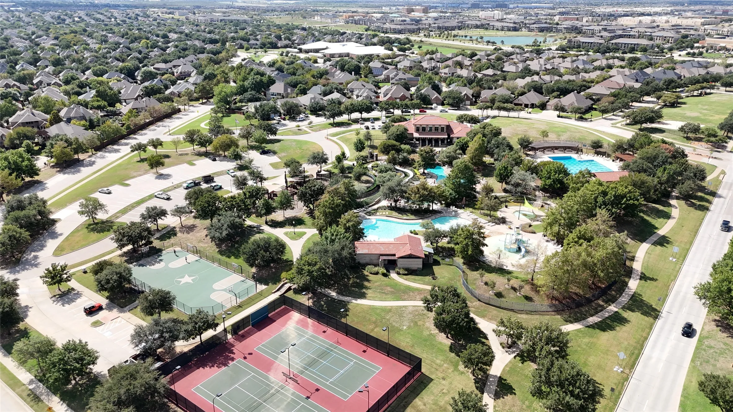 Birds-eye-view of clubhouse, amenities, and neighborhood