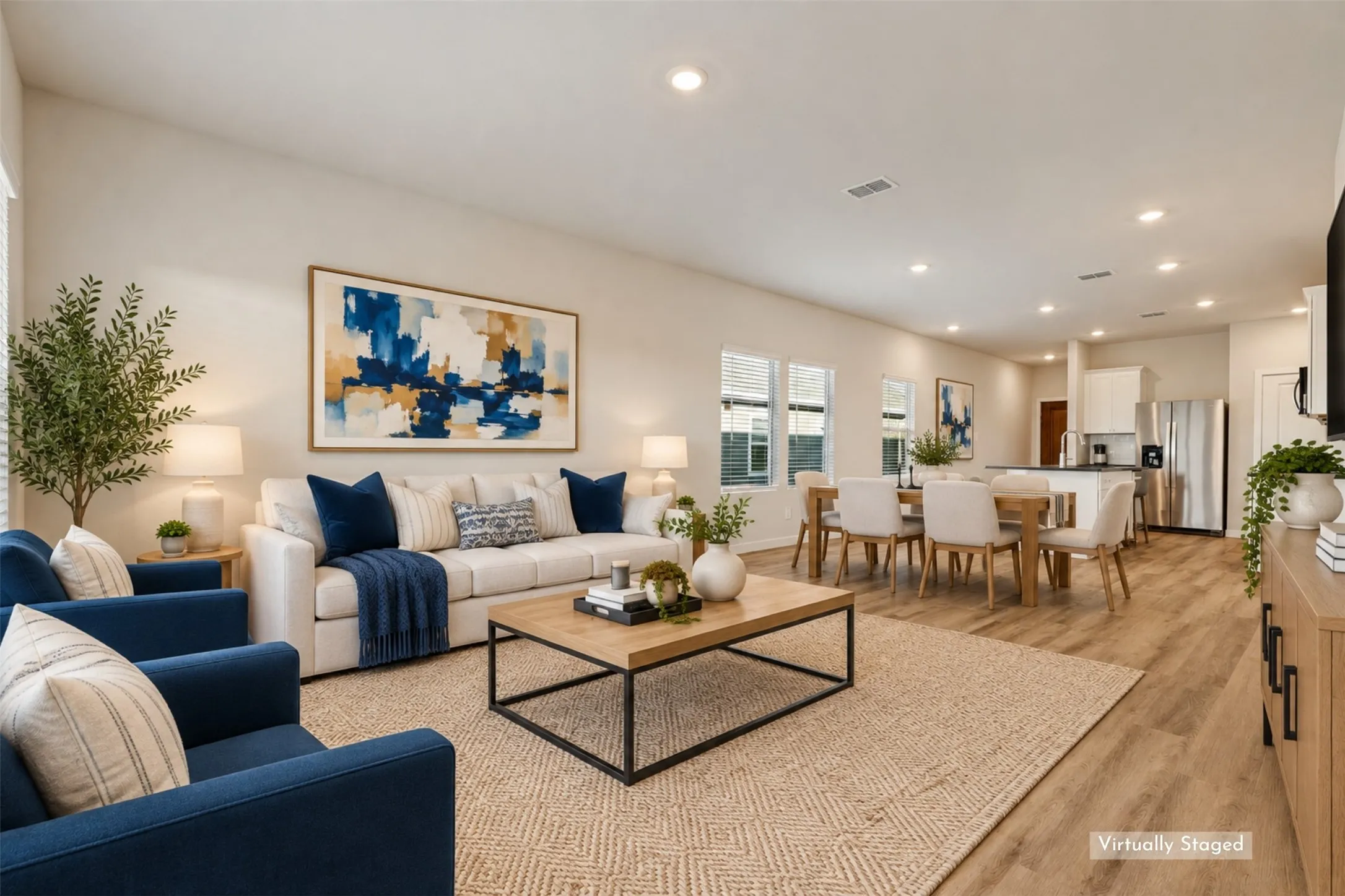 A Family Room That Feels Like Home! - Generous wall space, multiple windows, and a comfortable layout provide plenty of possibilities for relaxing, watching movies, or hosting friends. The seamless connection to the dining area and kitchen keeps everyone connected without sacrificing defined living spaces.