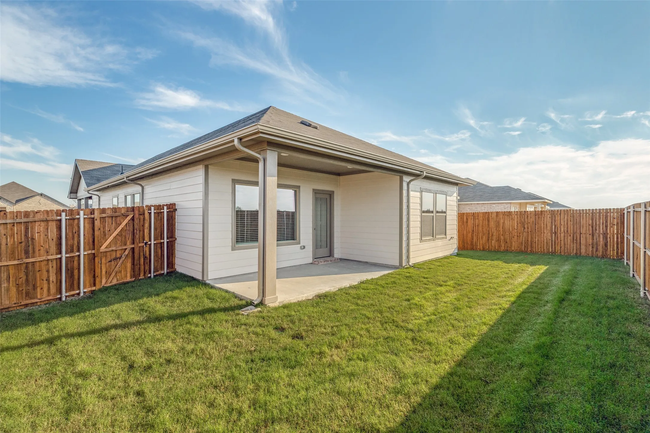 Fresh Sod, Privacy & Room to Enjoy the Outdoors! - The fully fenced backyard features fresh Bermuda sod, a six-foot board-on-board wood privacy fence, and a generous covered patio. There's plenty of room to relax, garden, entertain, or simply enjoy your own private outdoor space.