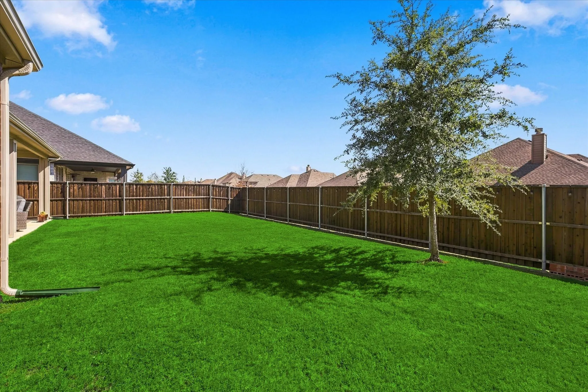 Plenty of yard for the kiddos, pets and-or a pool! Lights all around the BD on BD cedar fence!