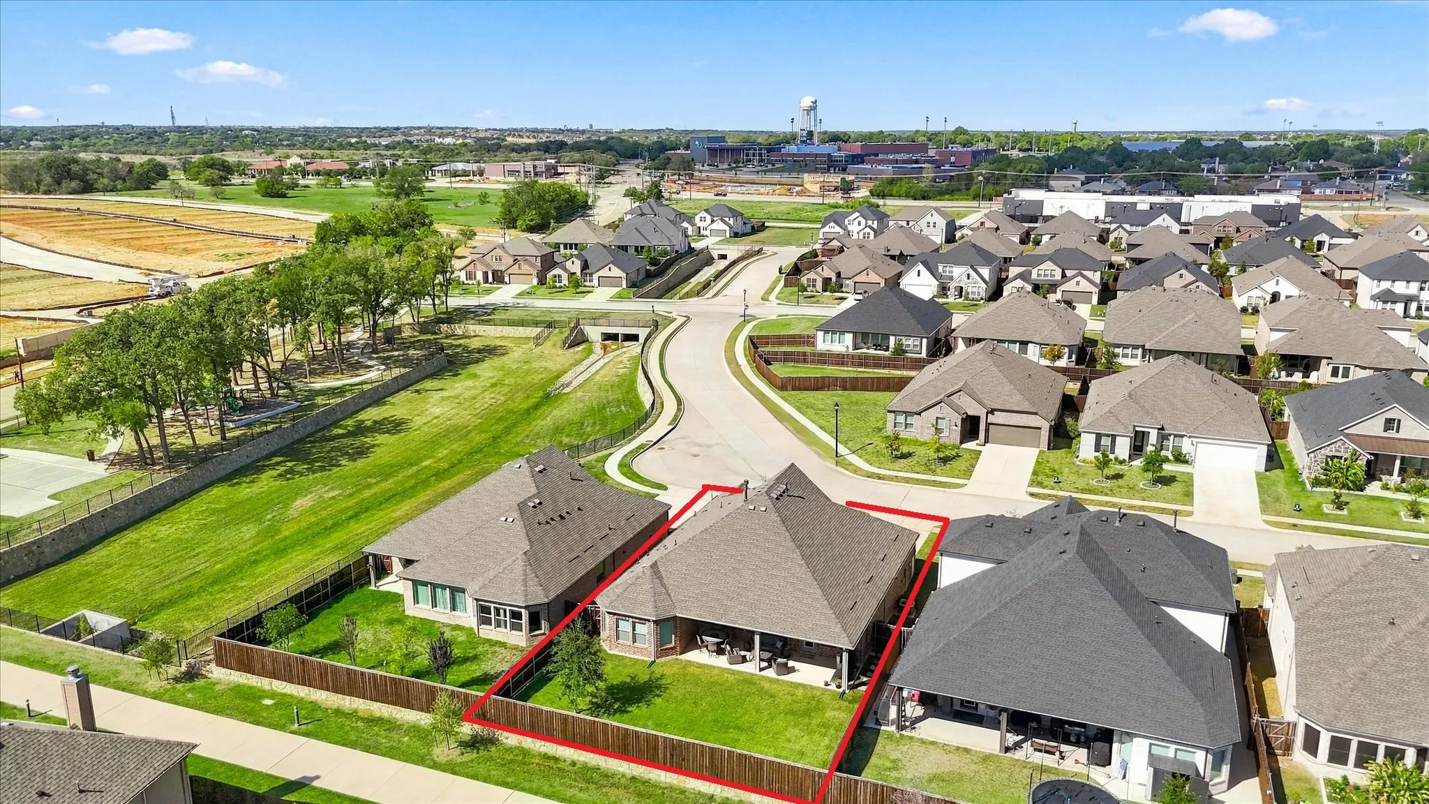 1 house over from the park, playground & trail which runs behind the home.