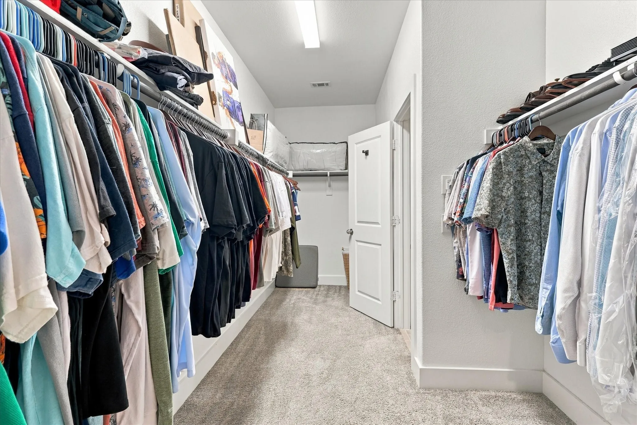 Plenty of closet space which also opens to the utility room for convenience.
