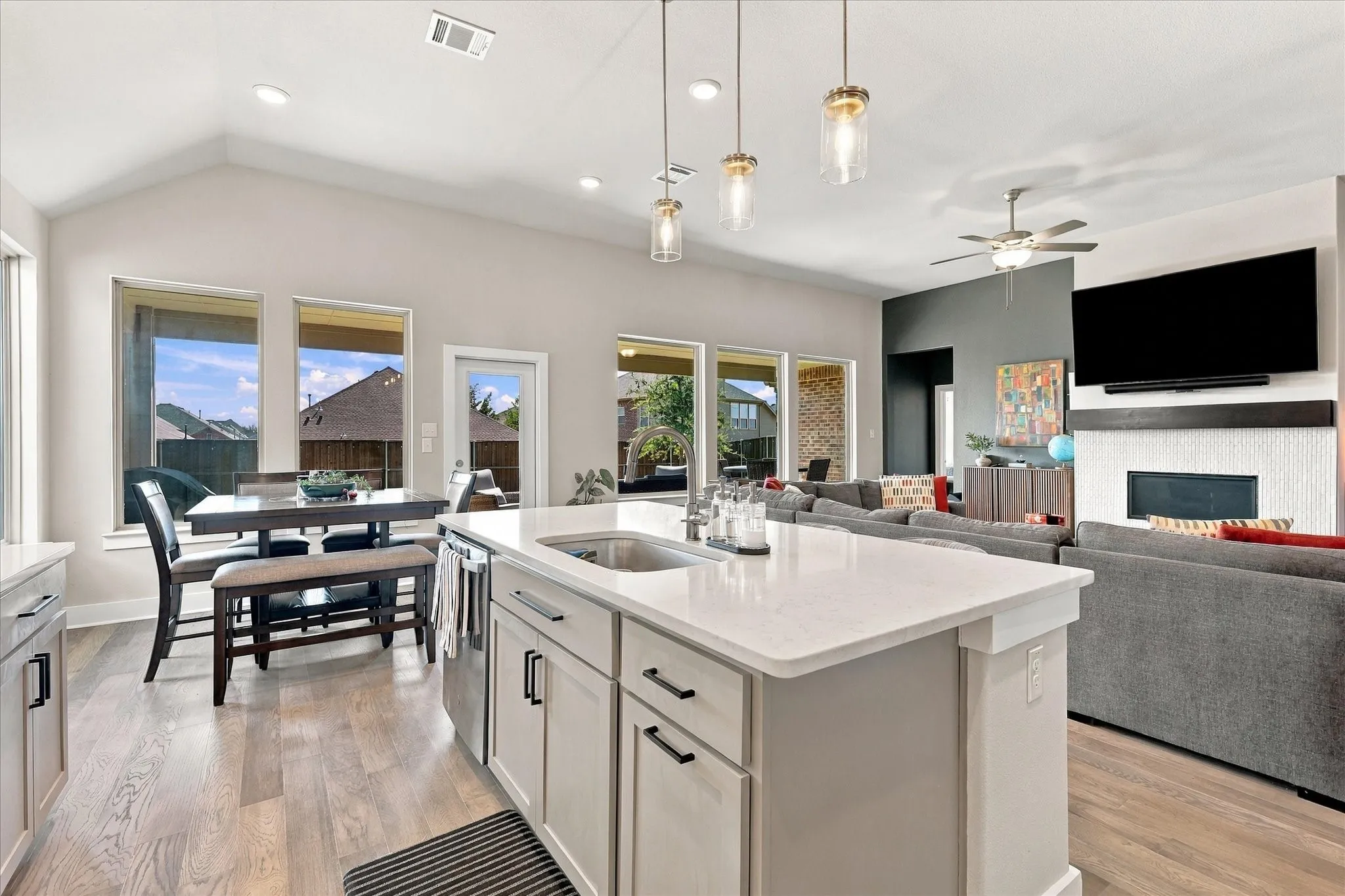 Large breakfast-dining area is also open to the heart of the home.