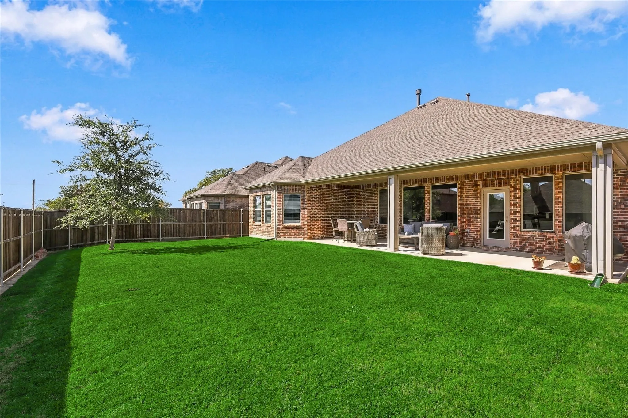 Plenty of yard for the kiddos, pets and-or a pool! Lights all around the BD on BD cedar fence!