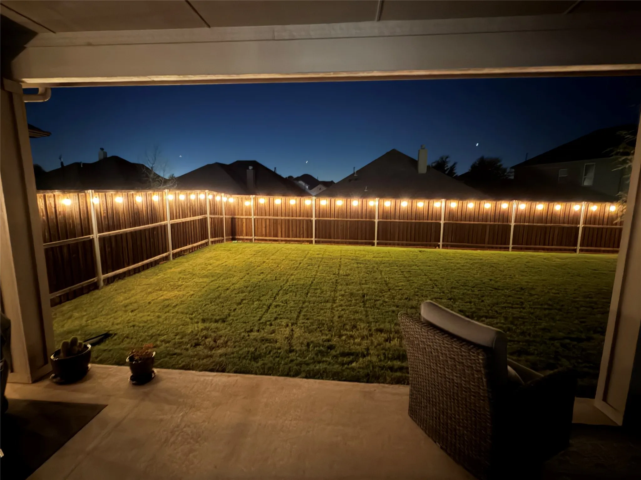 The back yard lights at night.
