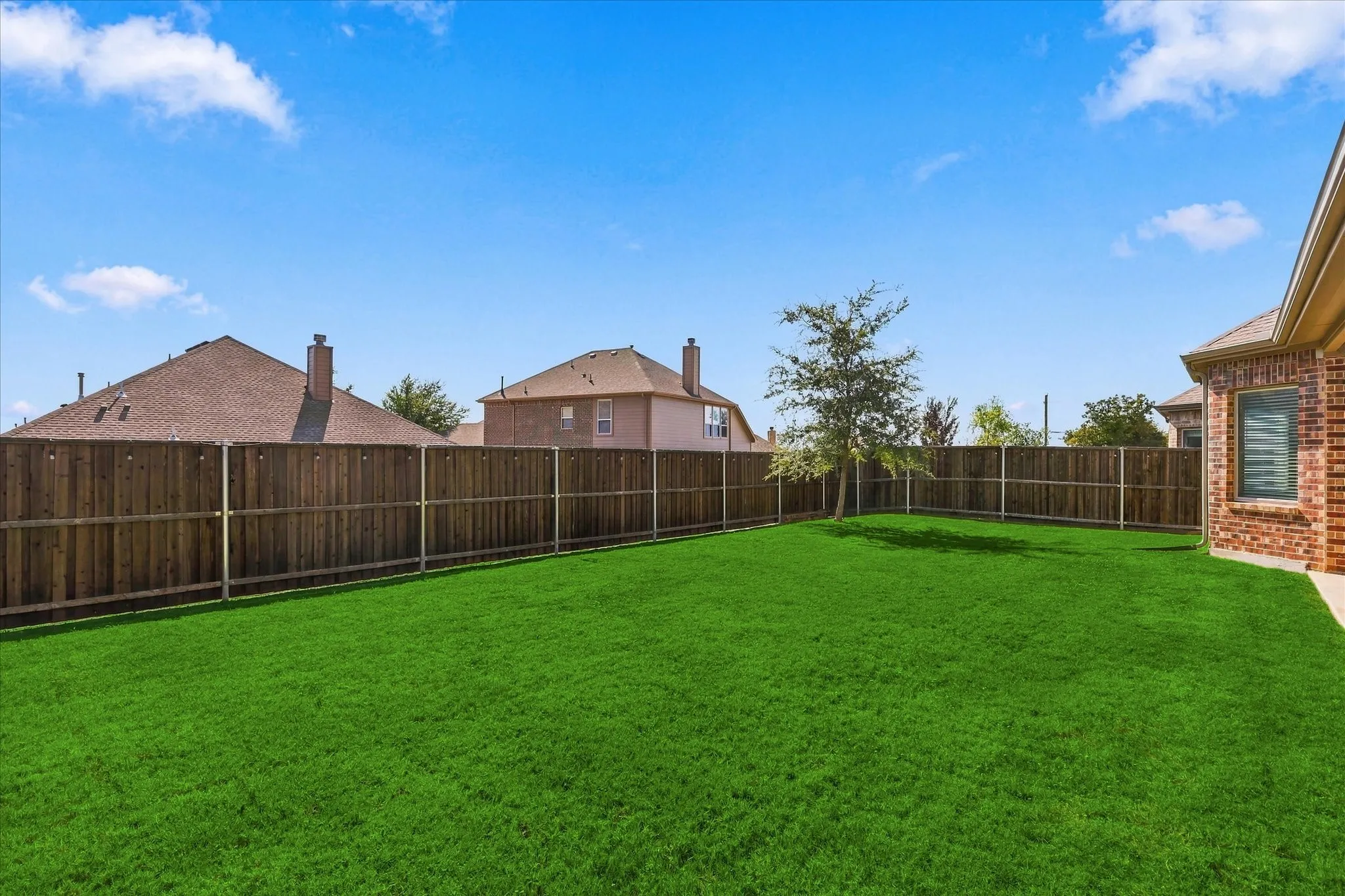 Plenty of yard for the kiddos, pets and-or a pool! Lights all around the BD on BD cedar fence!