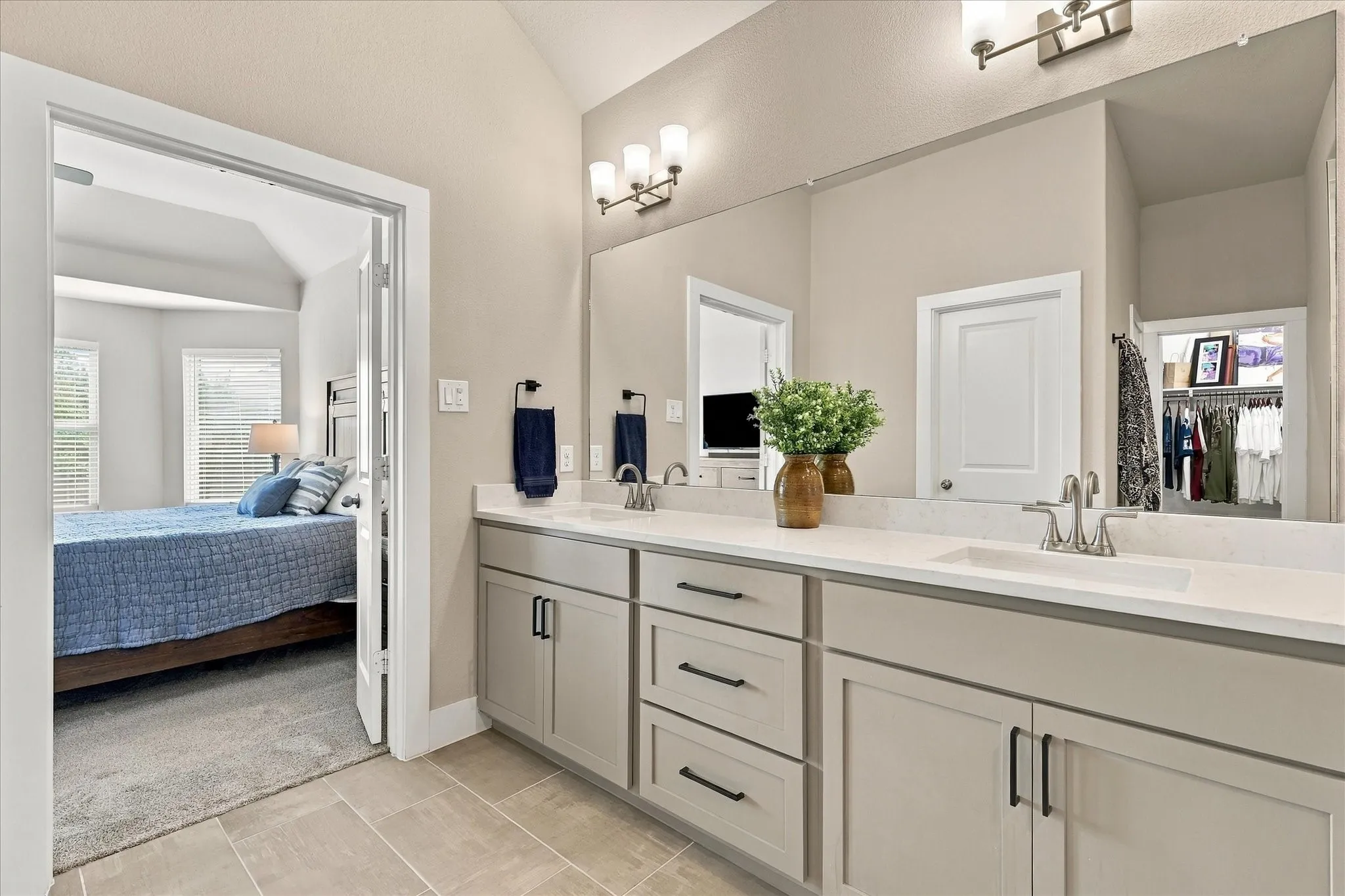 Ensuite has quartz top, dual sinks & an extra elongated walk-in shower with rain shower & 2nd head.
