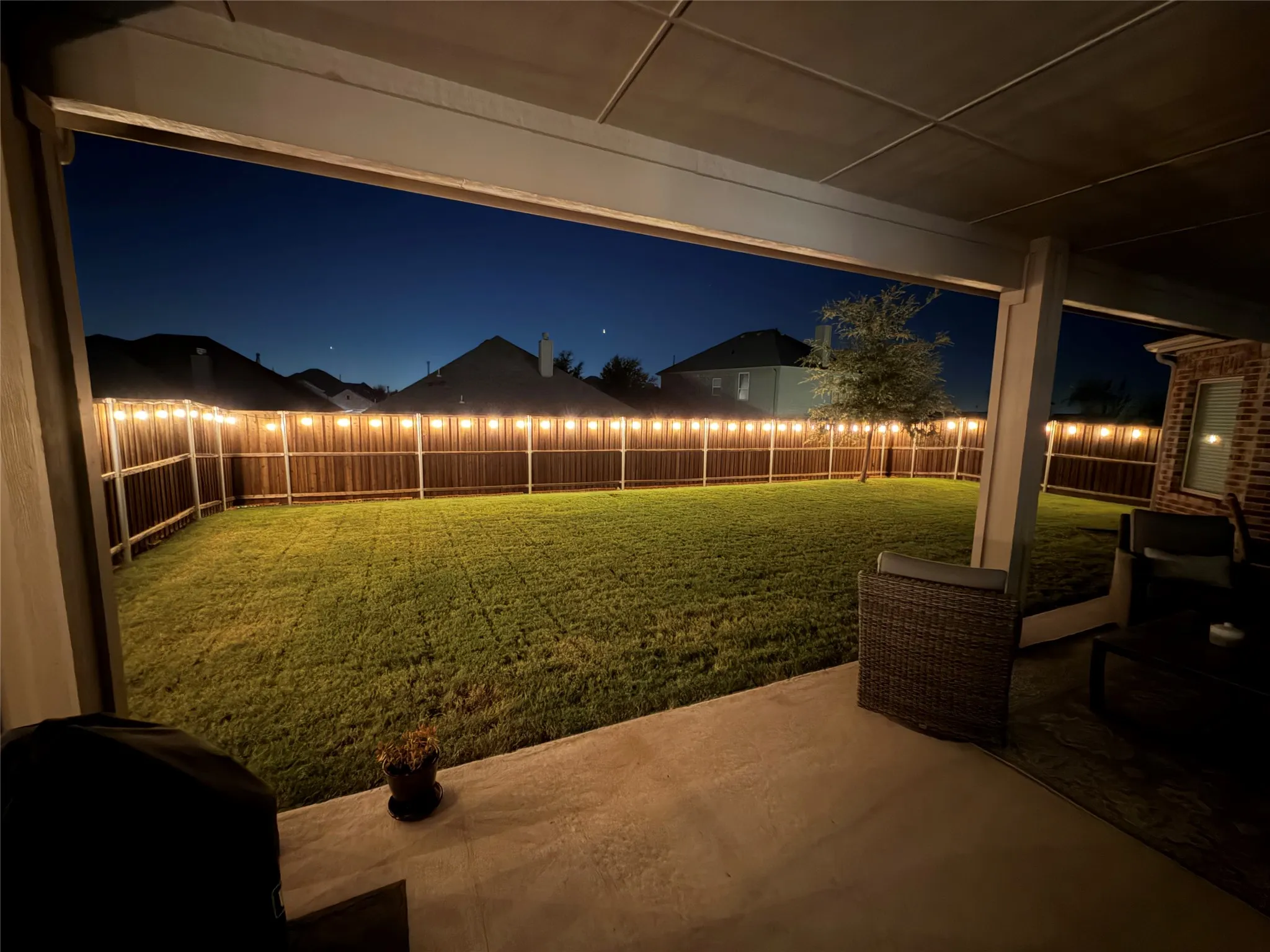 The back yard lights at night.