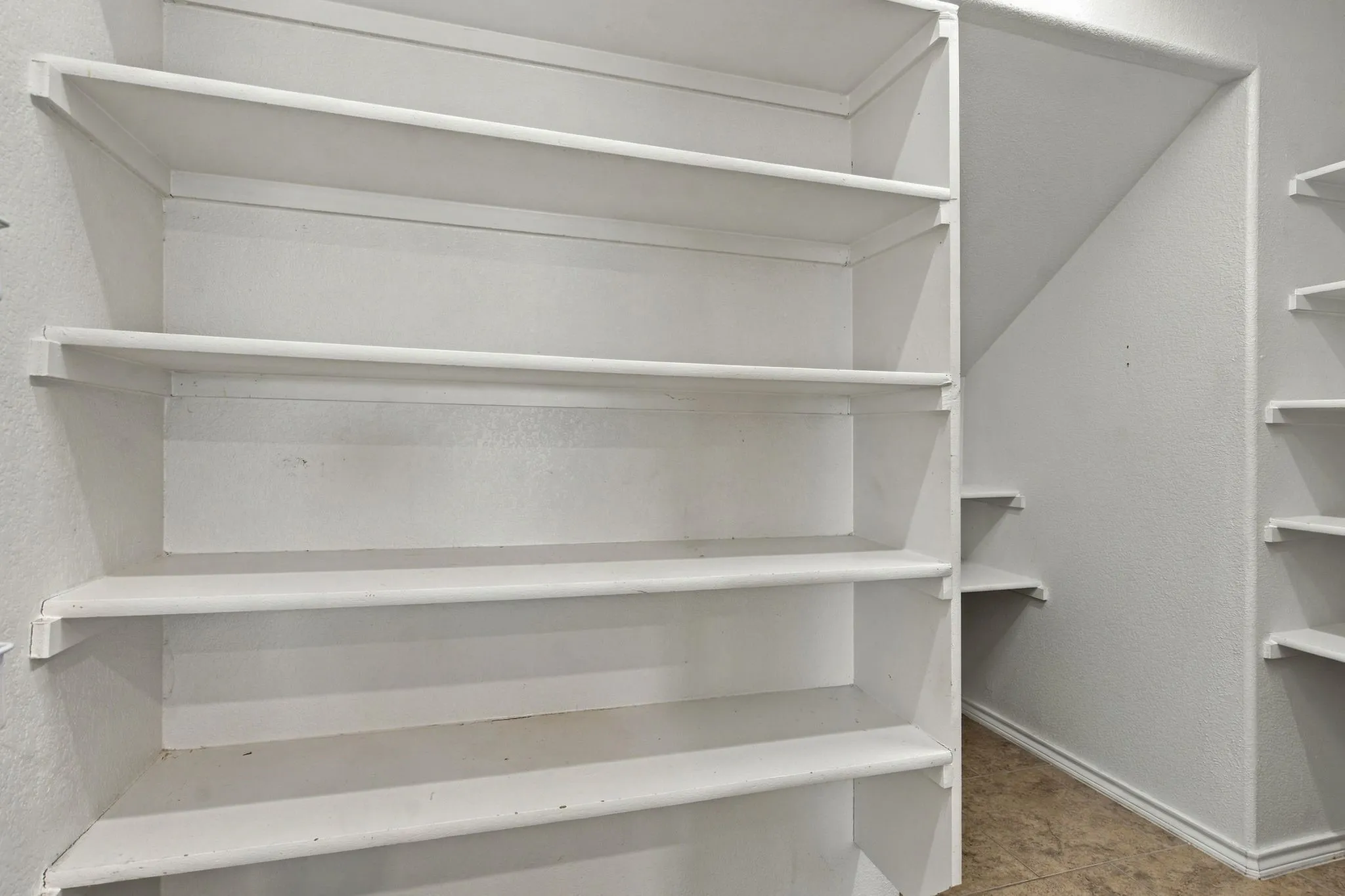 Built-in shelving with multiple storage levels