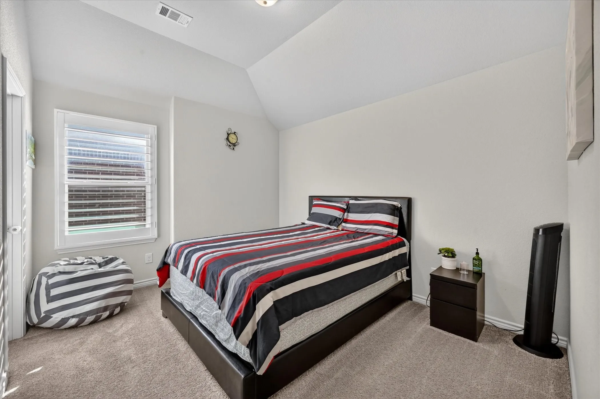 Sloped ceiling detail with recessed lighting
