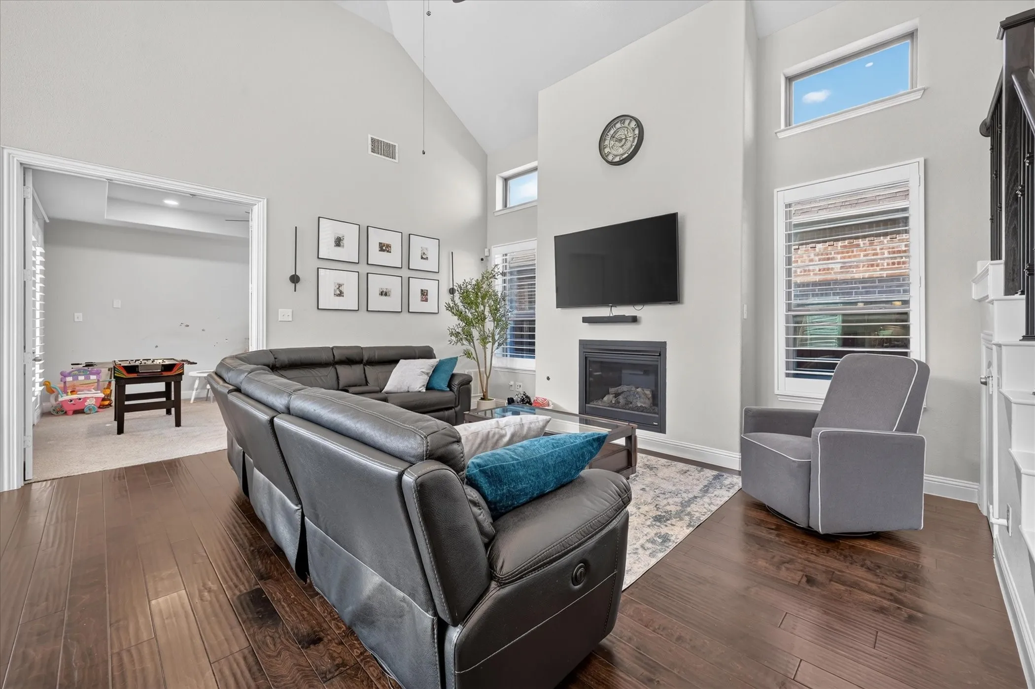 Vaulted ceiling with wood-finish flooring