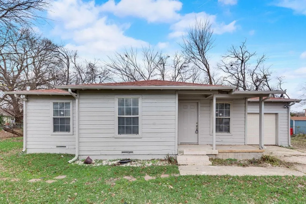 Single-story exterior with horizontal siding and a covered front porch