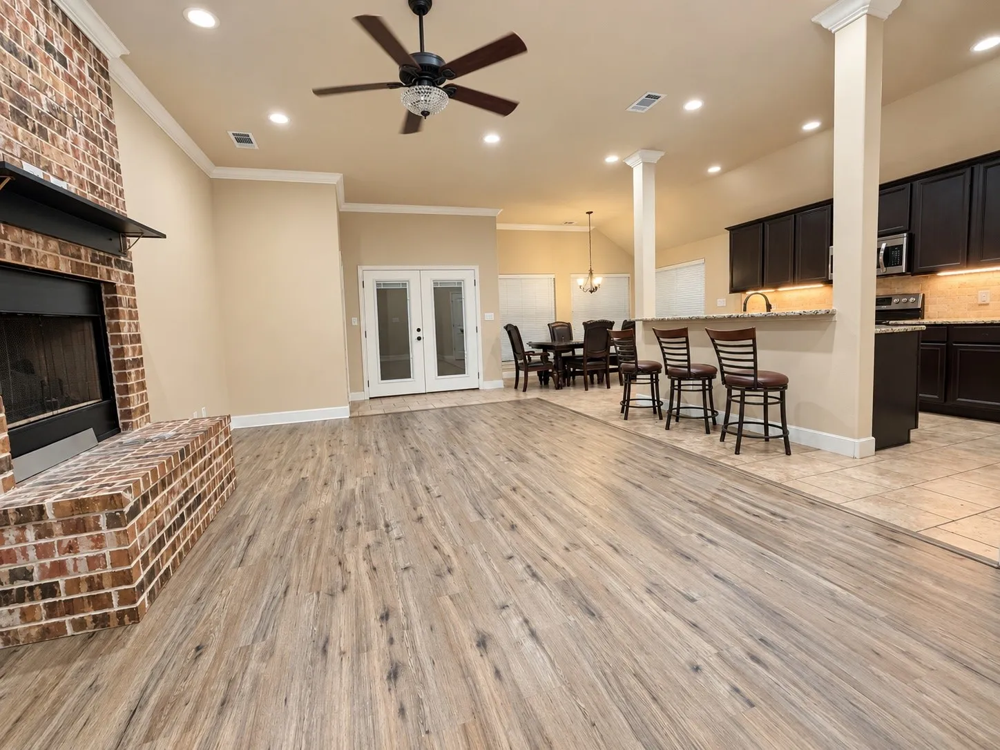 Wood-finish flooring throughout the living space