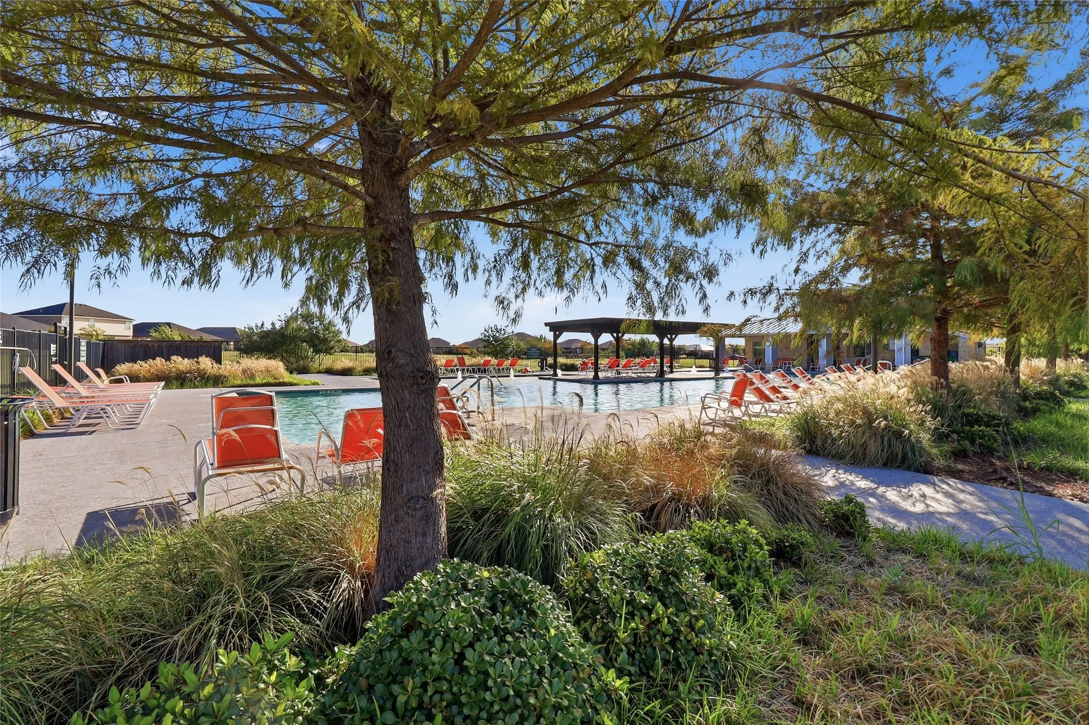 Resort style pool with beautiful landscaping