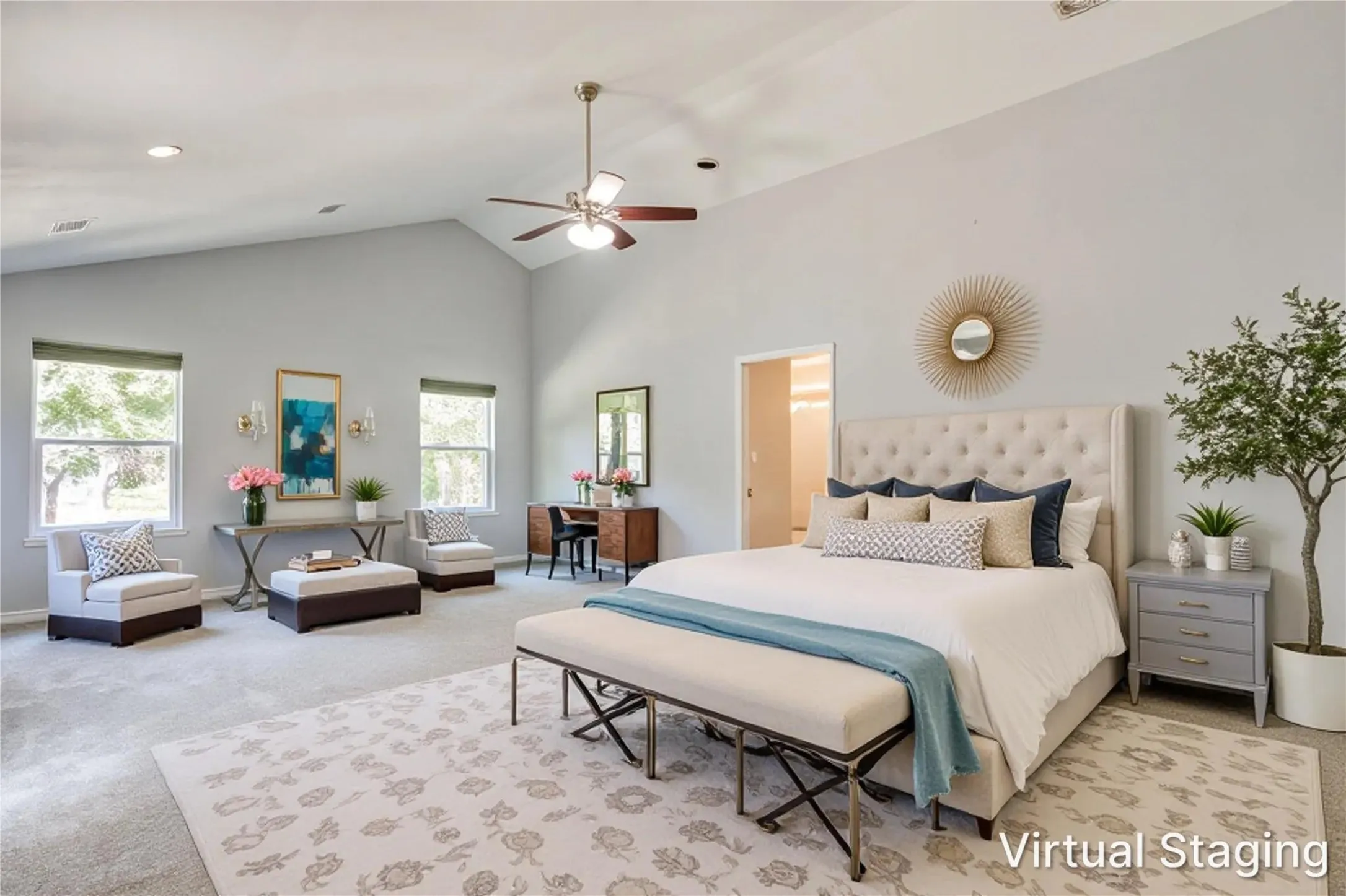 Vaulted ceiling, two windows, recessed lighting, ceiling fan, and carpeted flooring