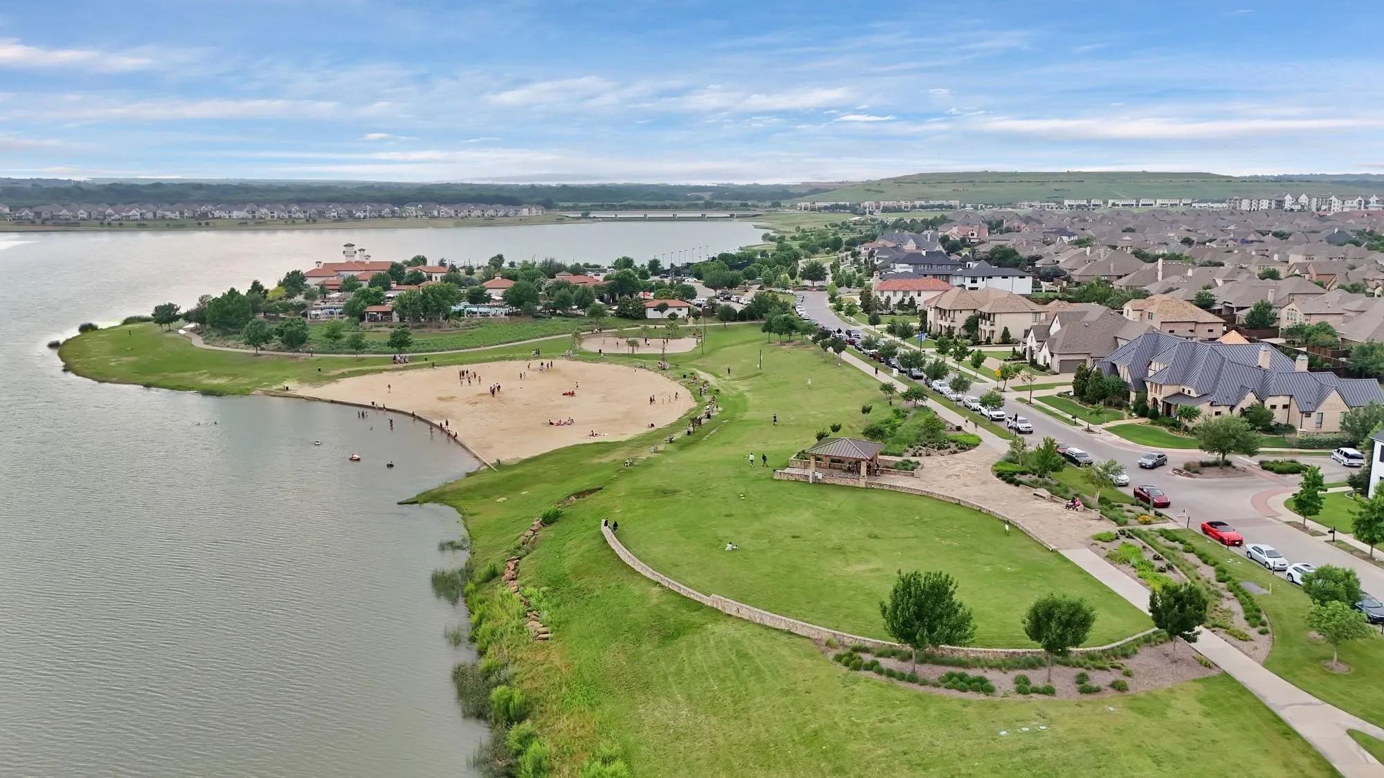 View of greenbelt & sandy beach on lake at Viridian