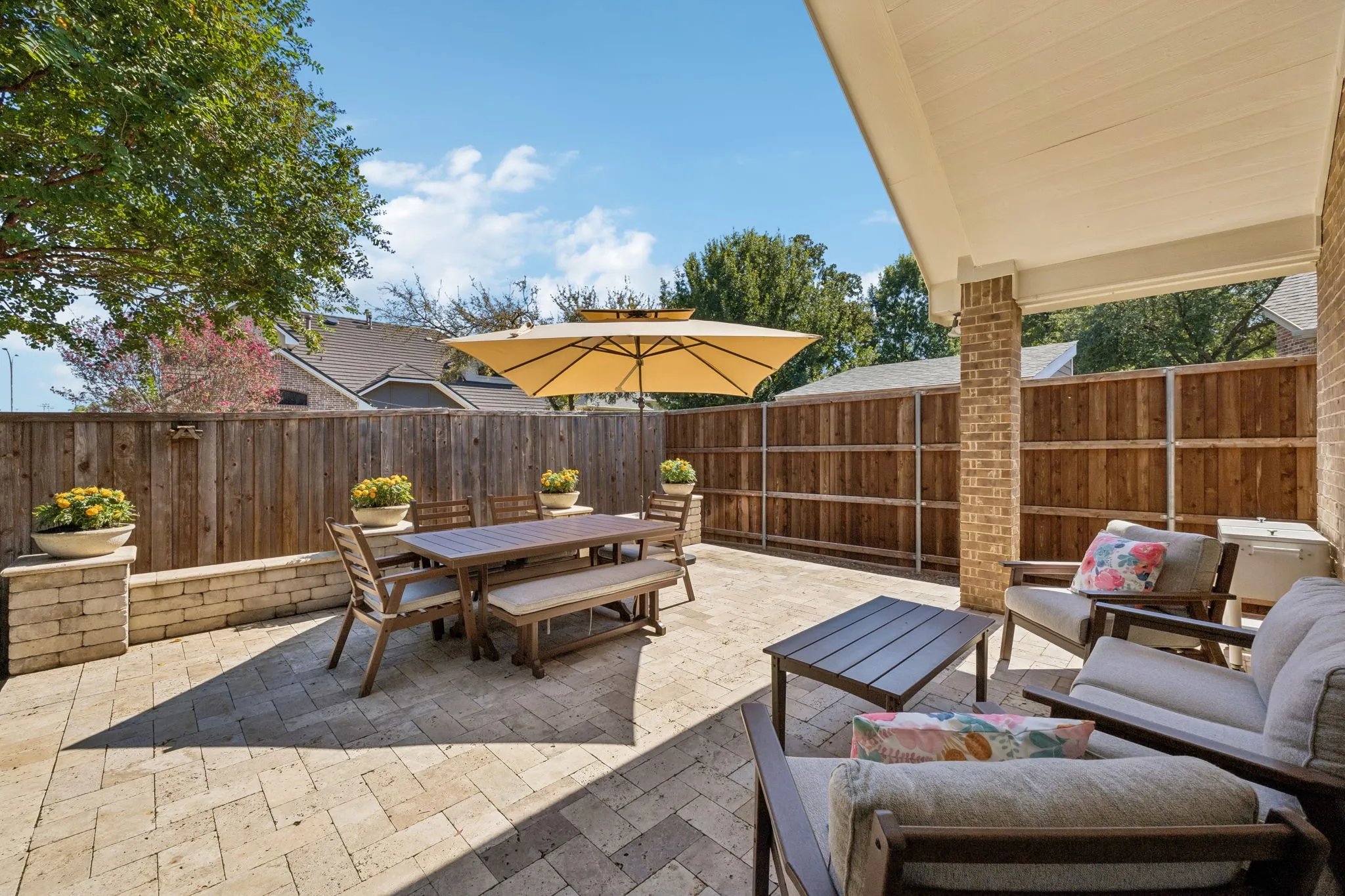 Covered patio extended to a paver patio for plenty of room to enjoy a cool fall evening!