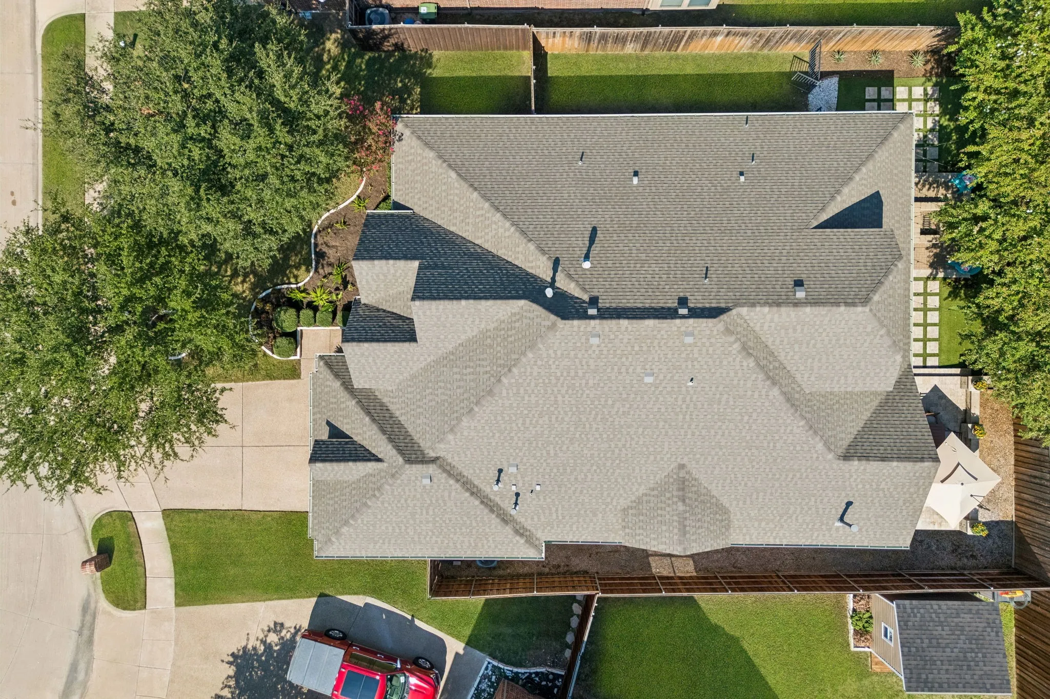 Bird's eye view of the house and yard.