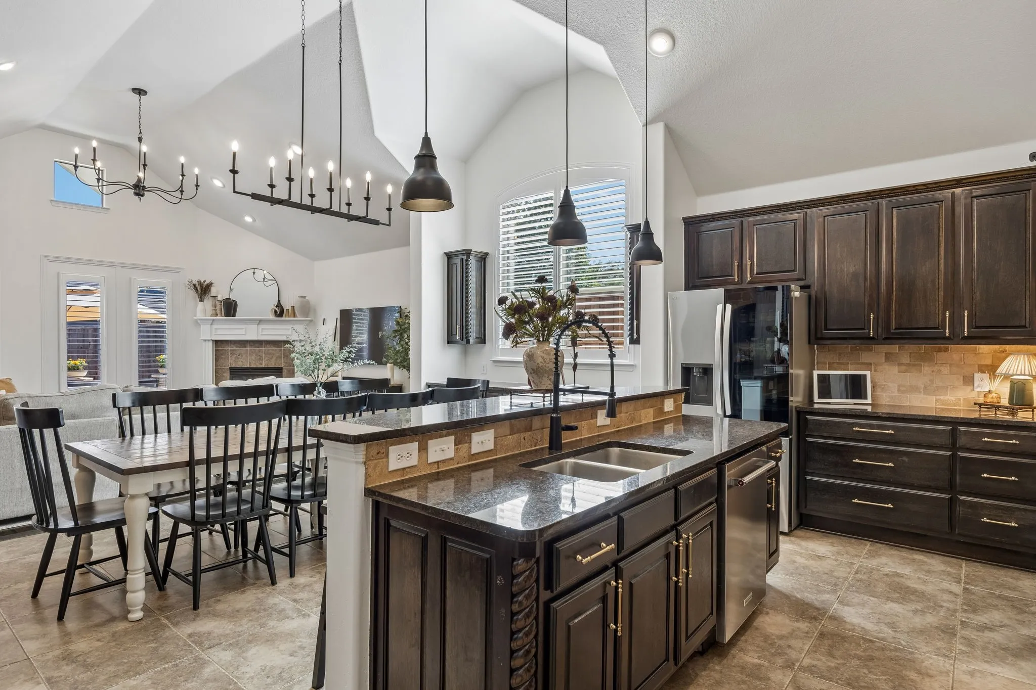 The living room, dining area and kitchen all flow together in the open concept floor plan