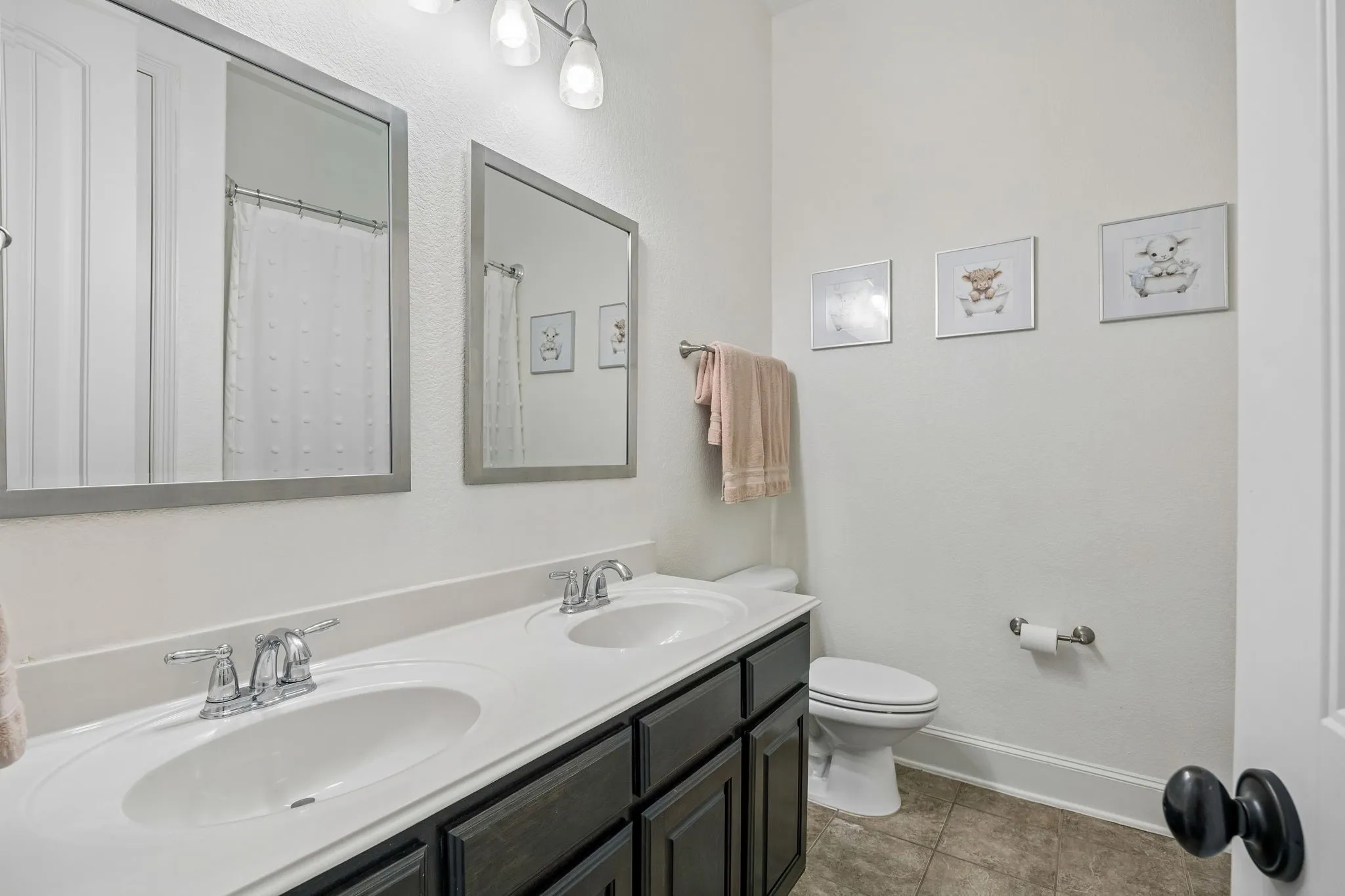 Full bathroom with a large vanity and 2 sinks