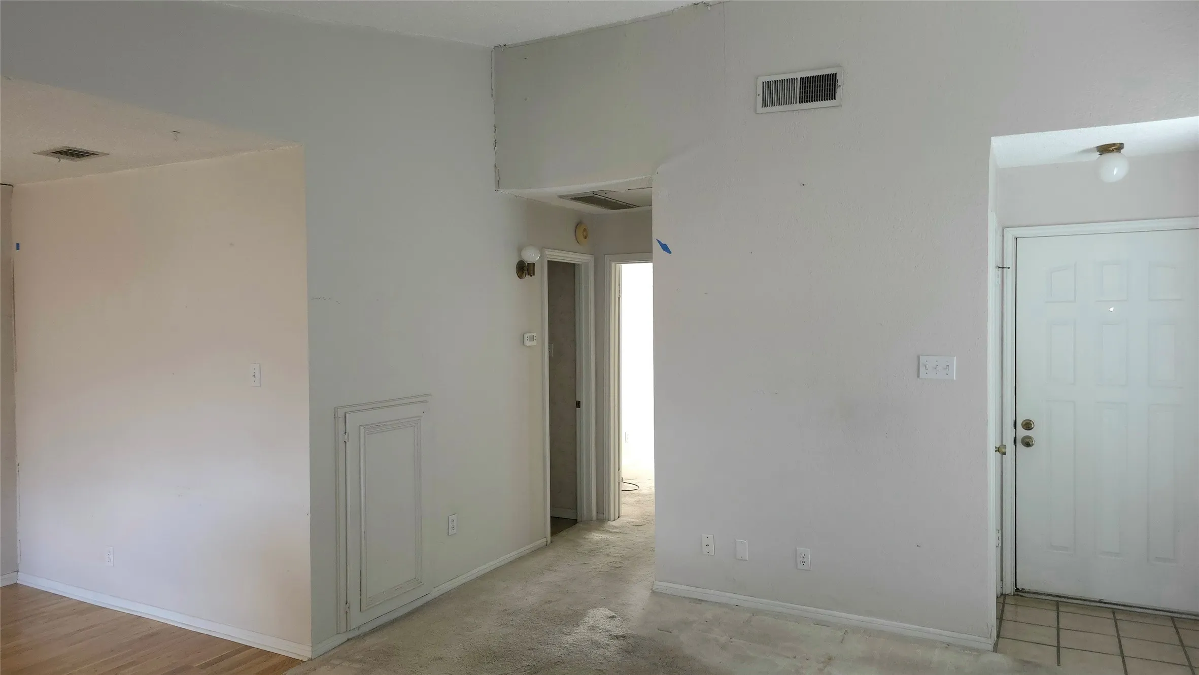View of entry door from living