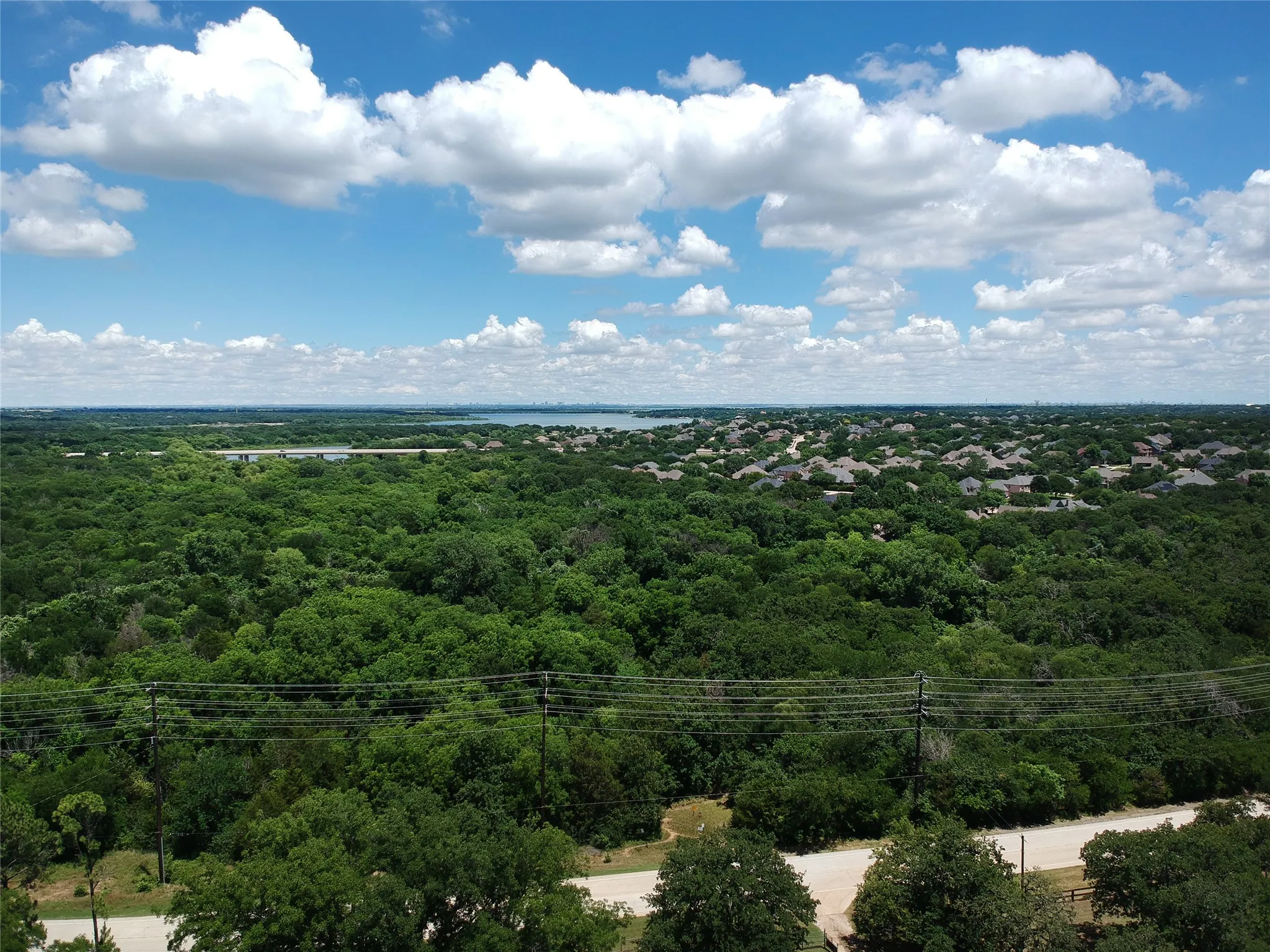 Expansive green landscape with dense tree coverage
