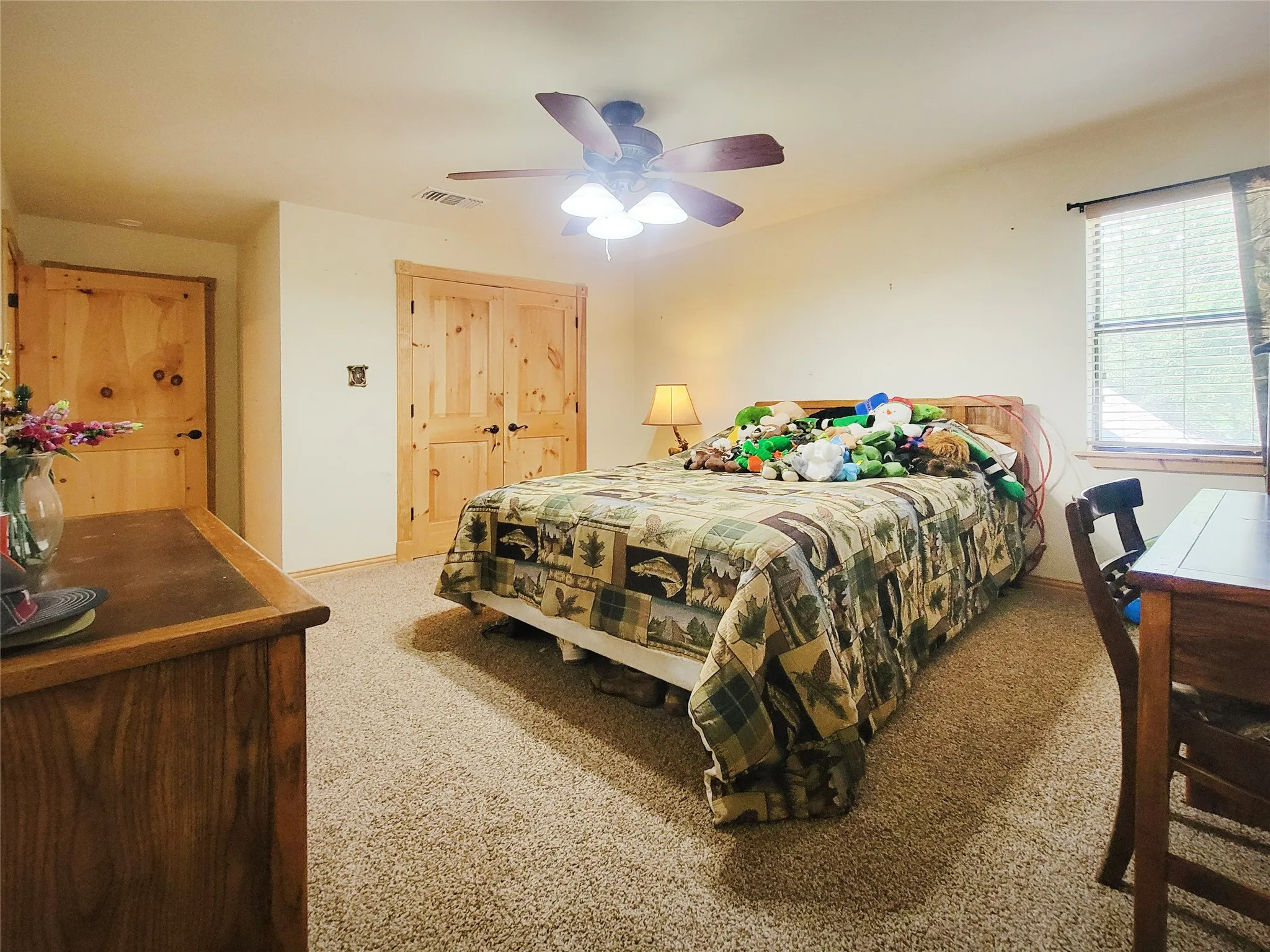 Neutral-toned carpeting throughout