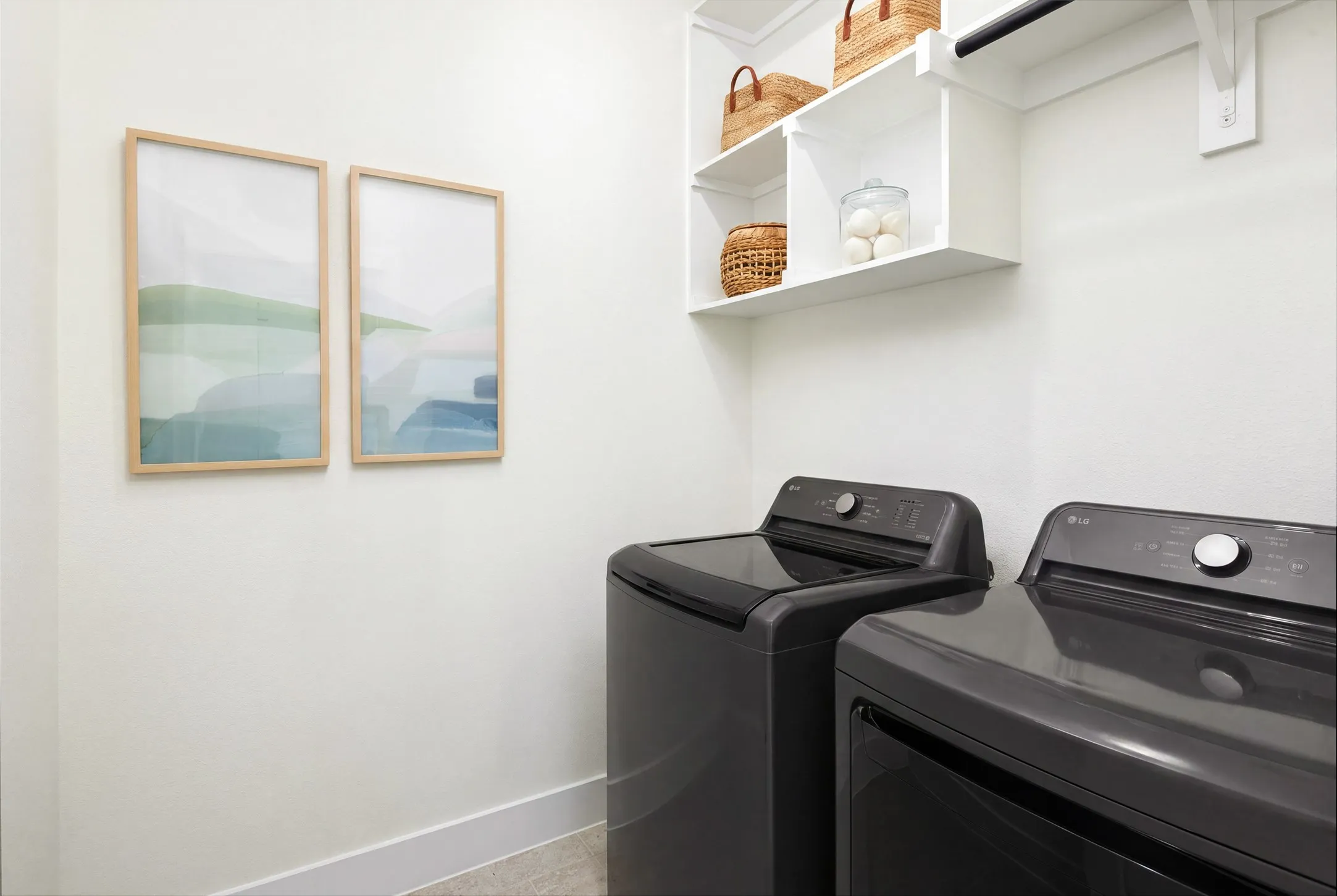 White walls with integrated shelving and a clothes hanging rod