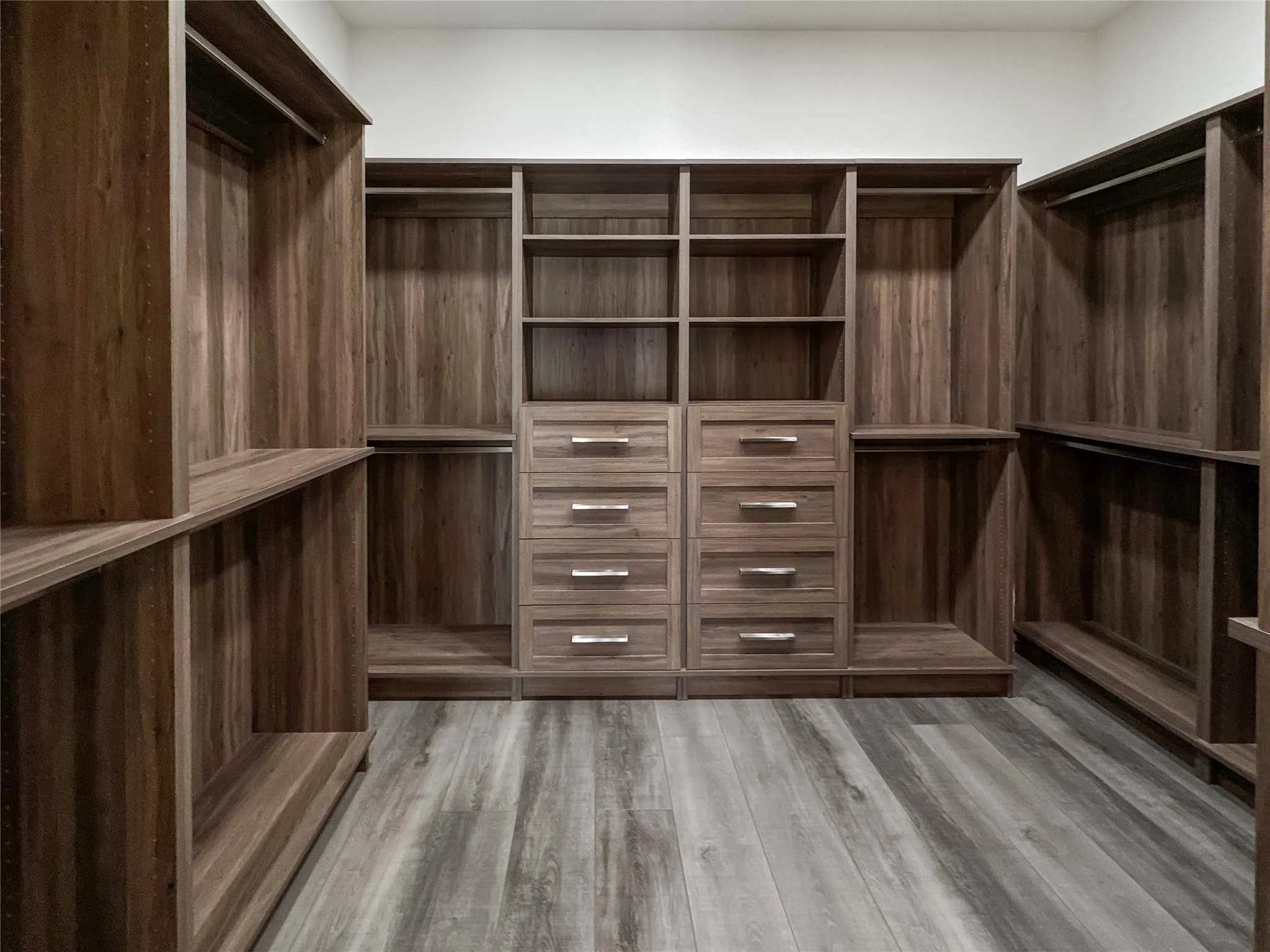 Spacious closet featuring wood-type flooring