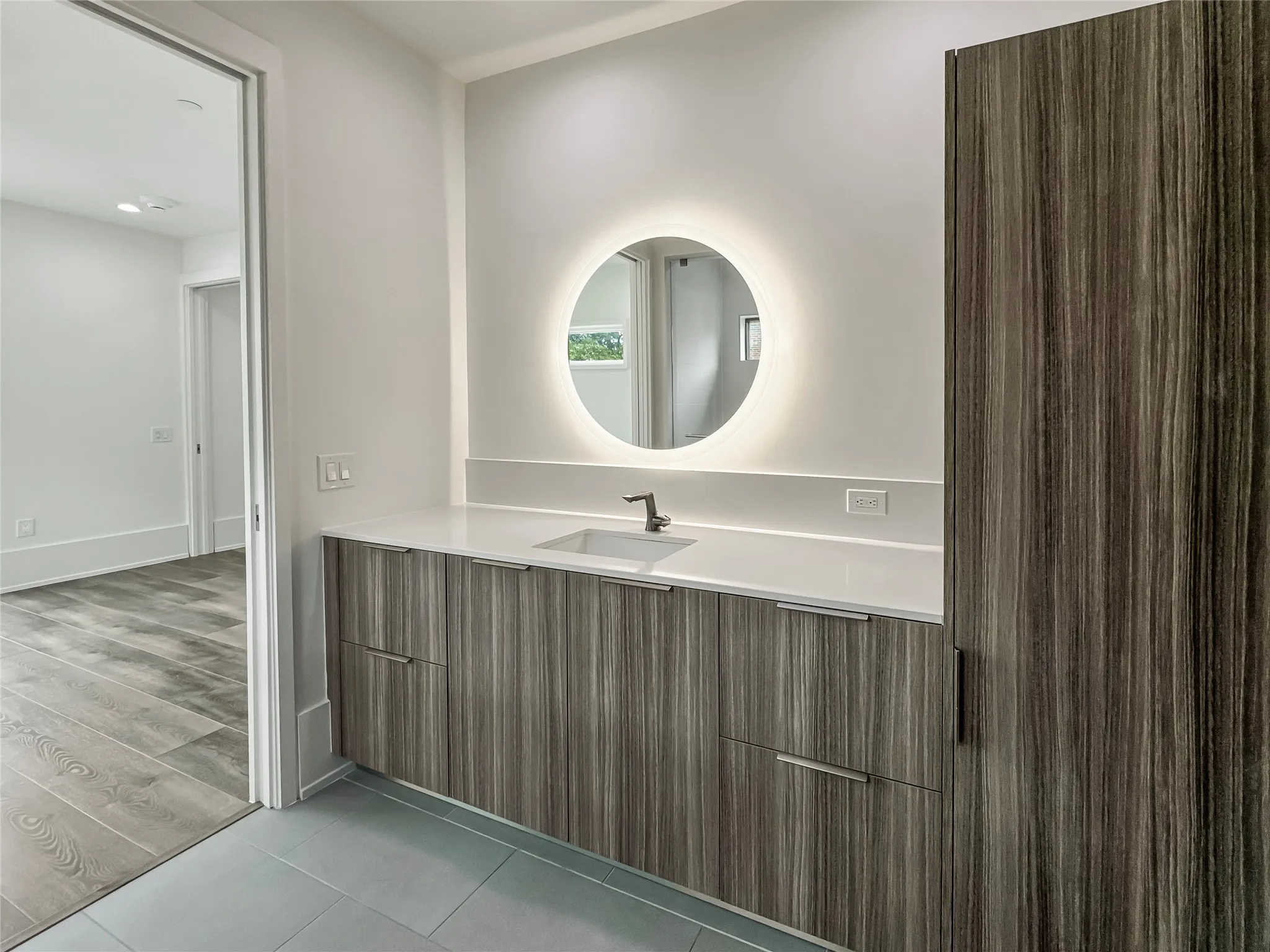 Bathroom featuring vanity and hardwood / wood-style floors