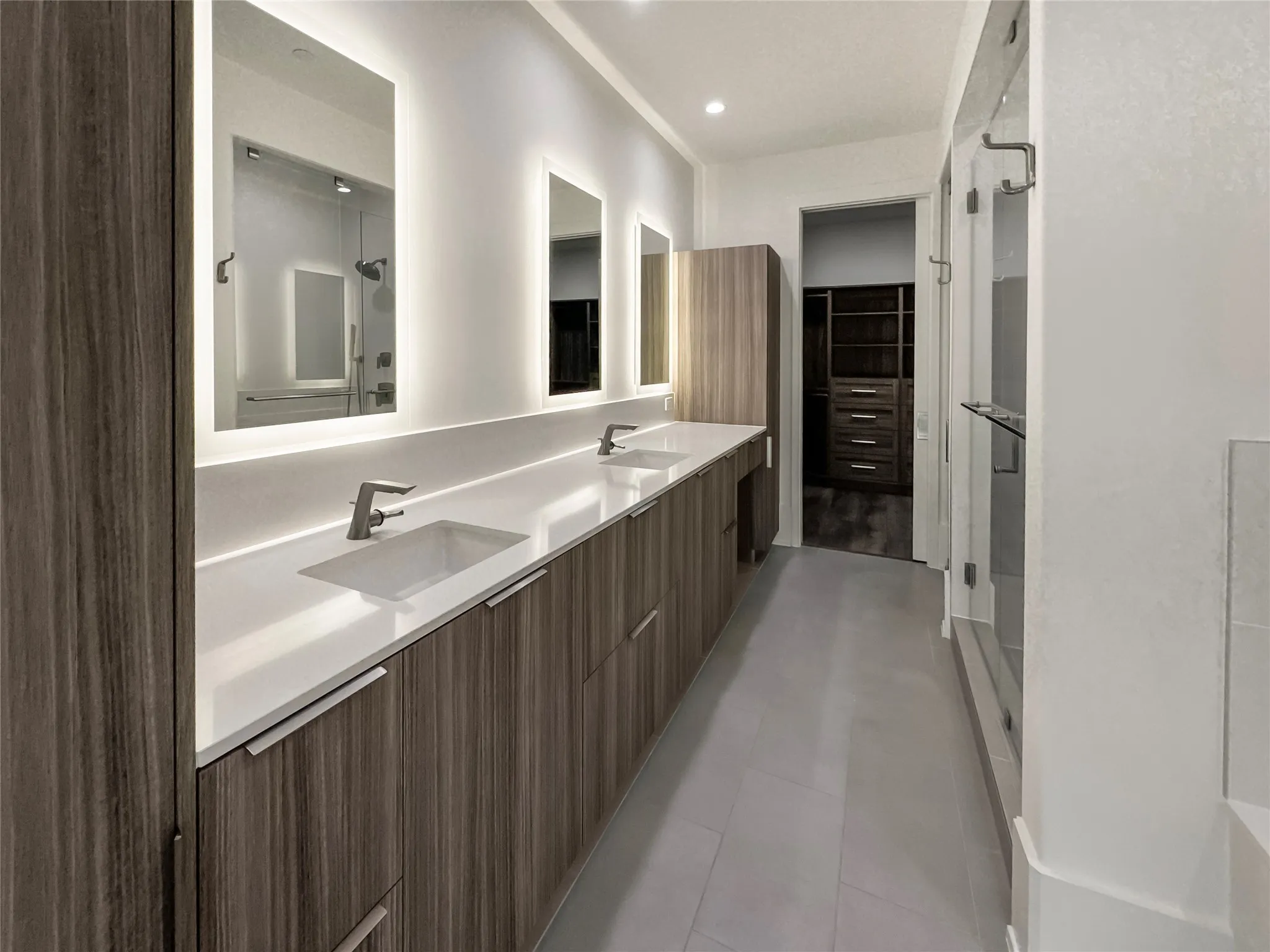 Bathroom featuring vanity and tile patterned flooring