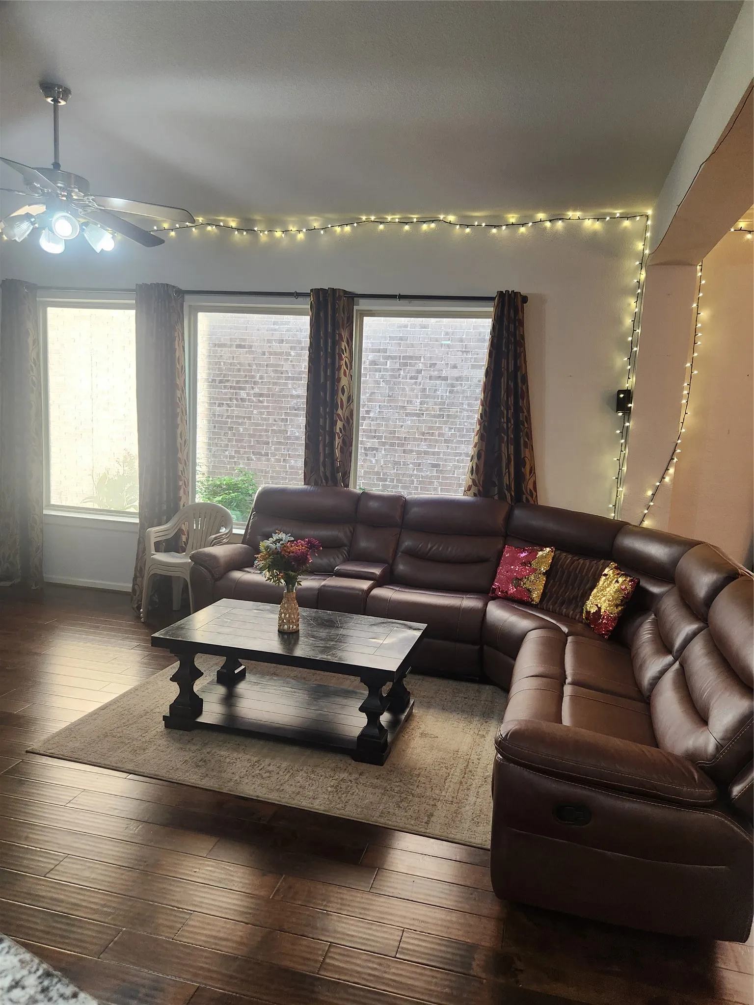 Recessed lighting, wood-finish flooring, and multiple windows