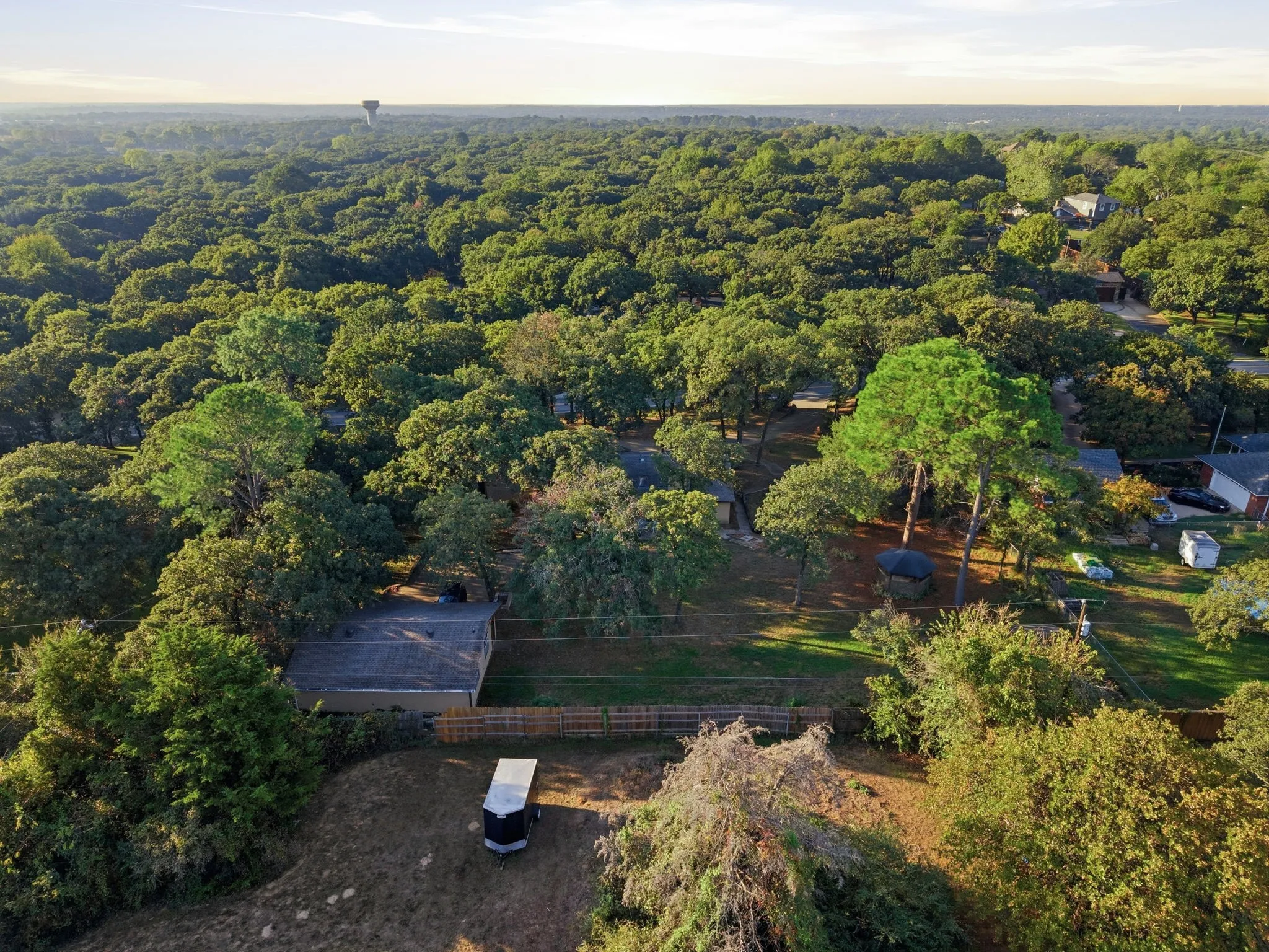 Expansive property surrounded by abundant mature trees