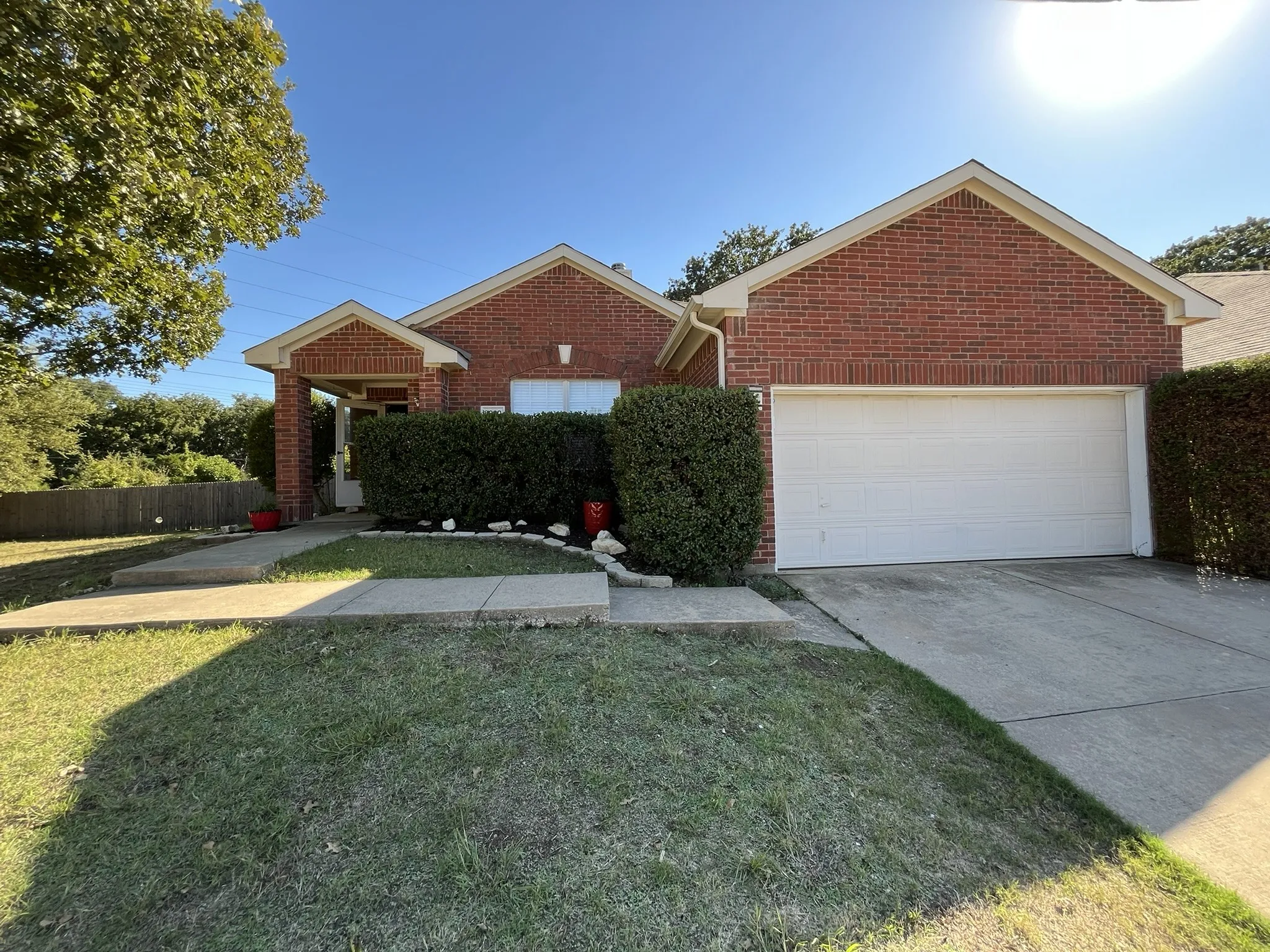 Brick exterior with a covered entry