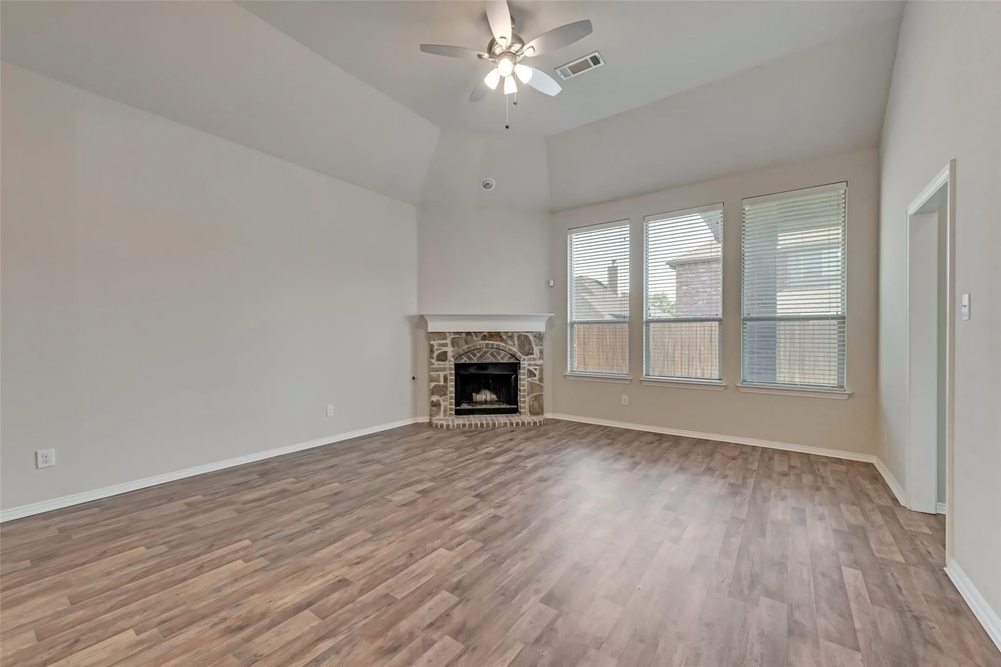 LIVING ROOM VIEW WITH FIREPLACE!
