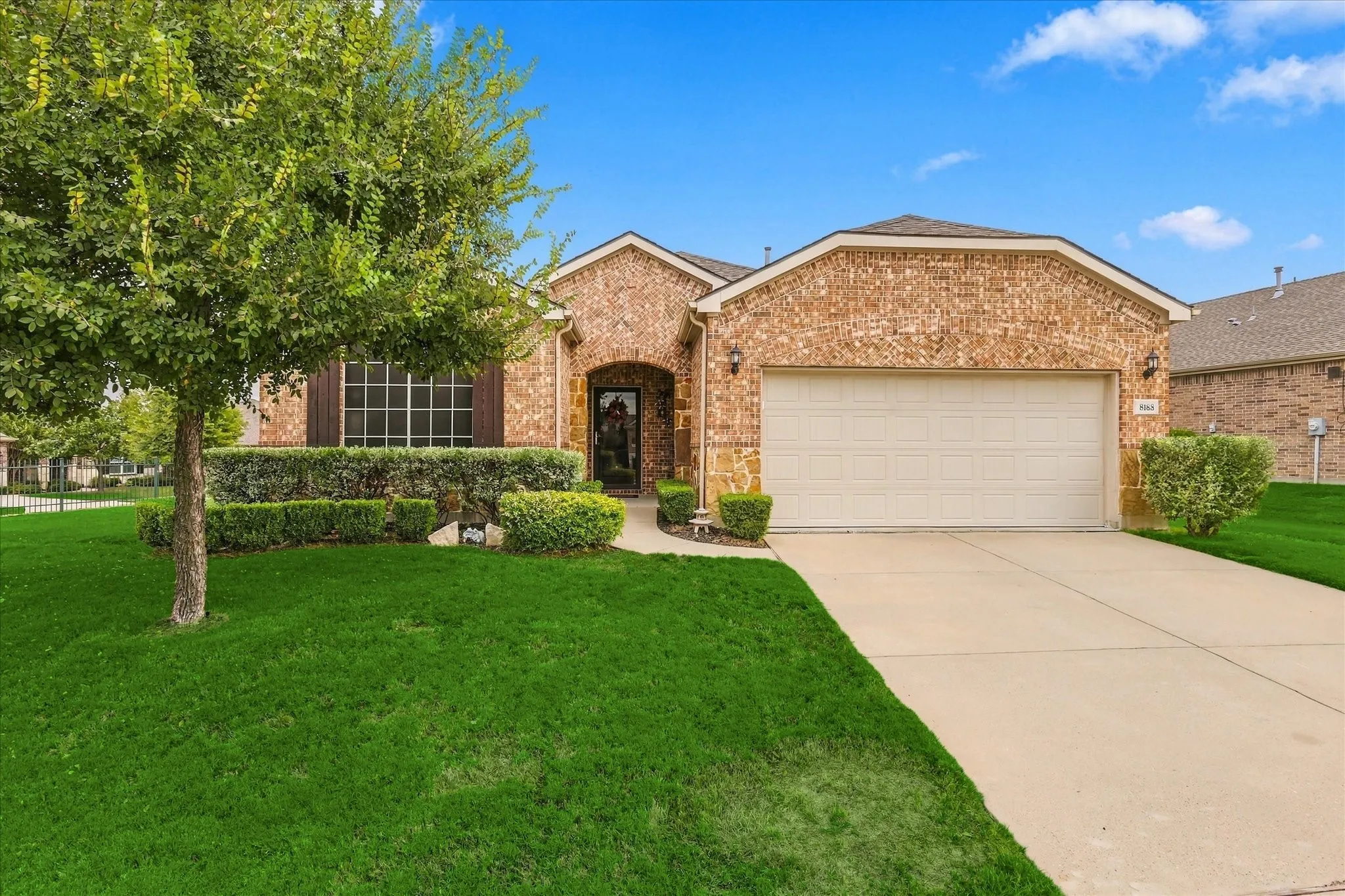 Well Maintained Abbeyville Model on a Corner Lot with manicured landscaping.