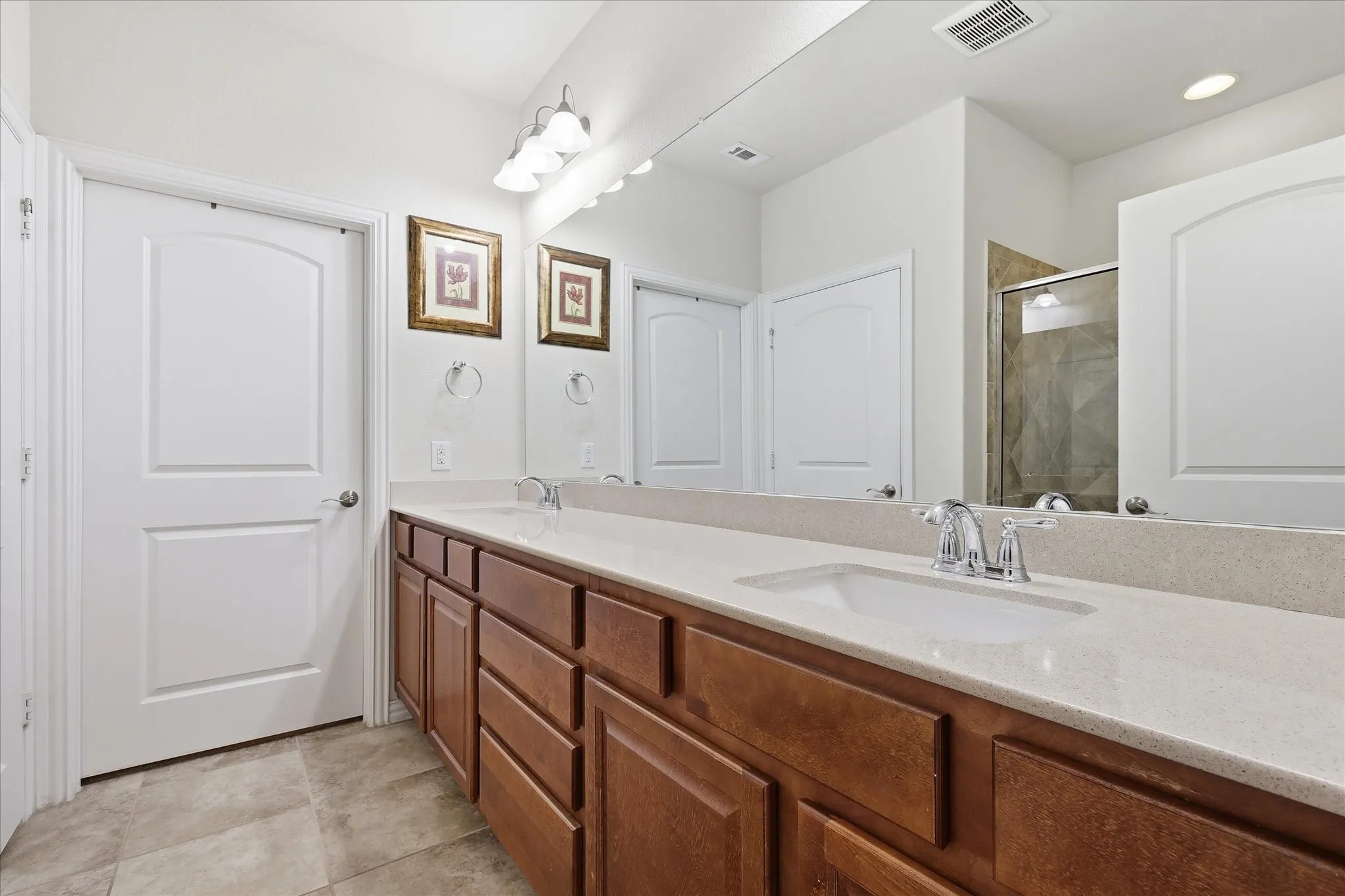 Primary Bathroom with dual sinks and Quartz Counters