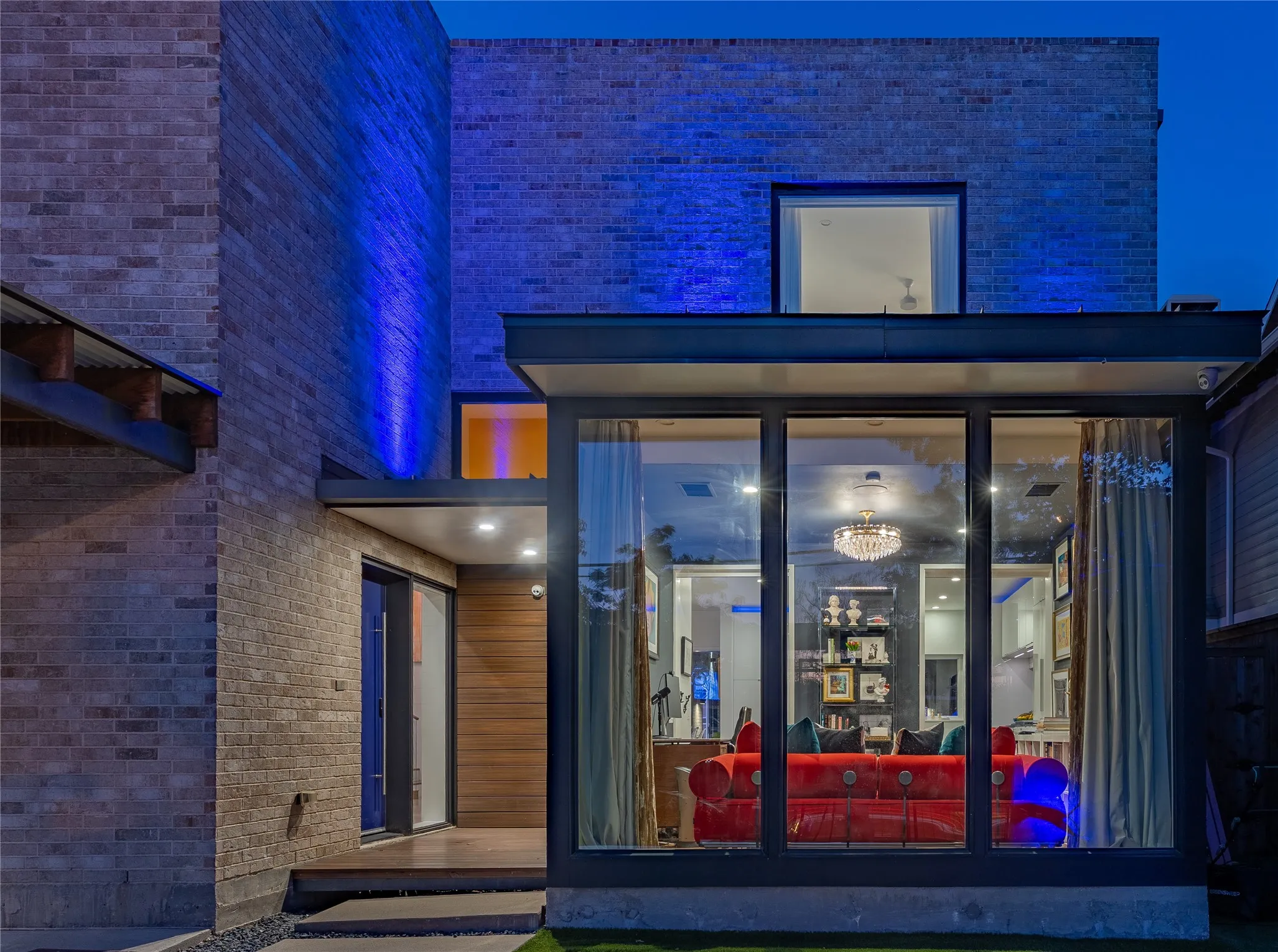 Walk through the home's private courtyard to the subtle entry, where the amazing energy greets you upon opening the front door.