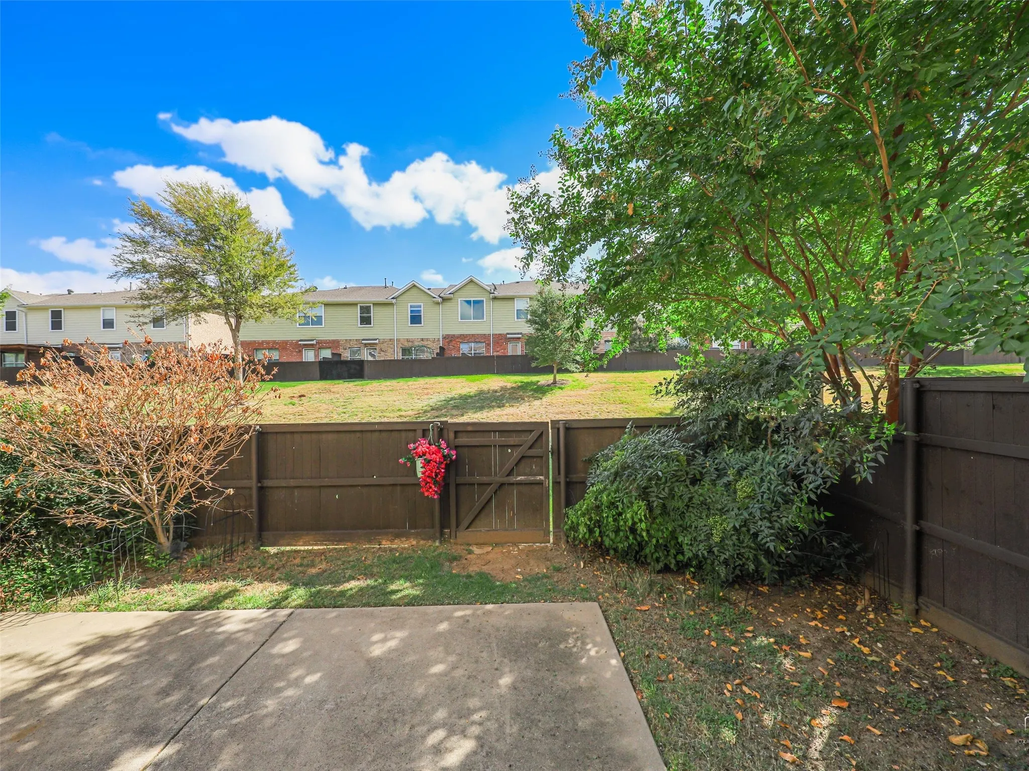 The HOA maintains the front and backyard mowing, in-ground sprinkler system and fencing.