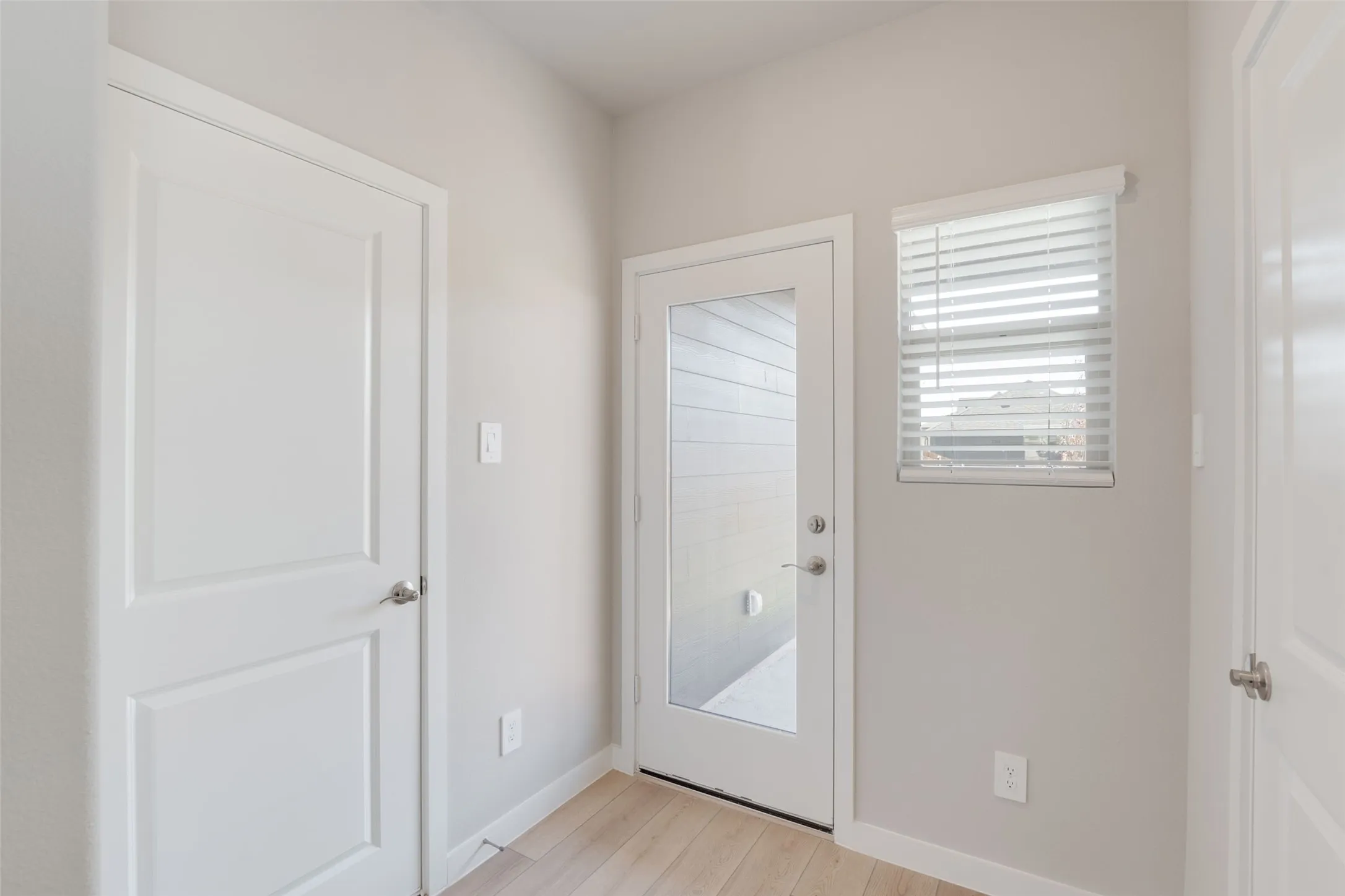 Garage door and backdoor to covered patio