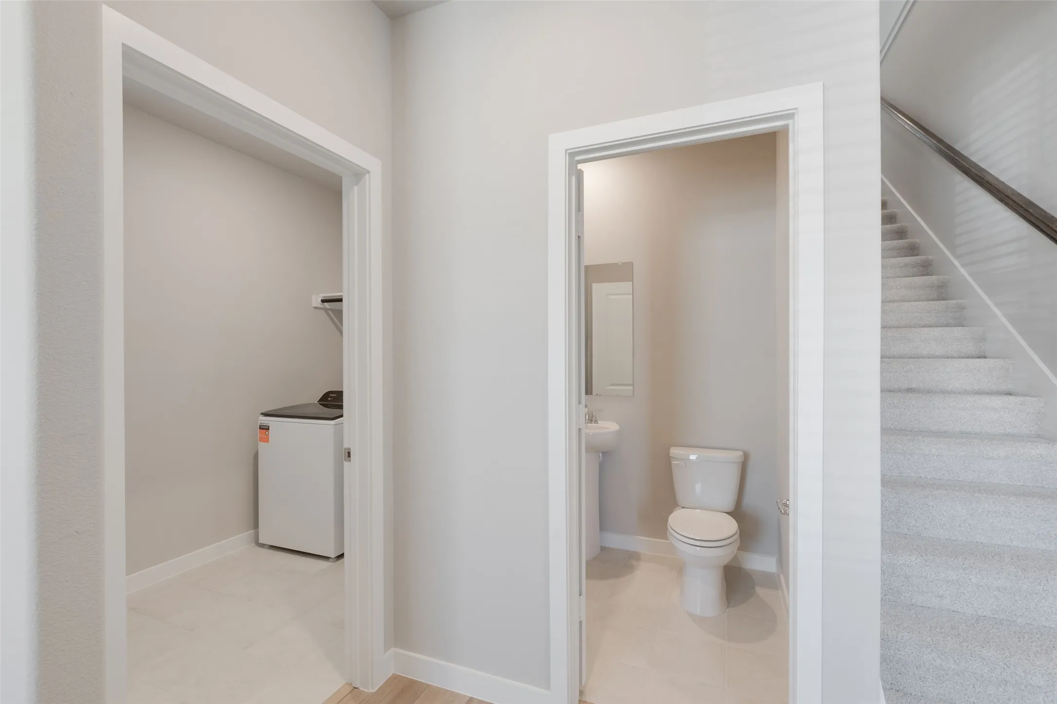 Downstairs: Half bath and Utility Room