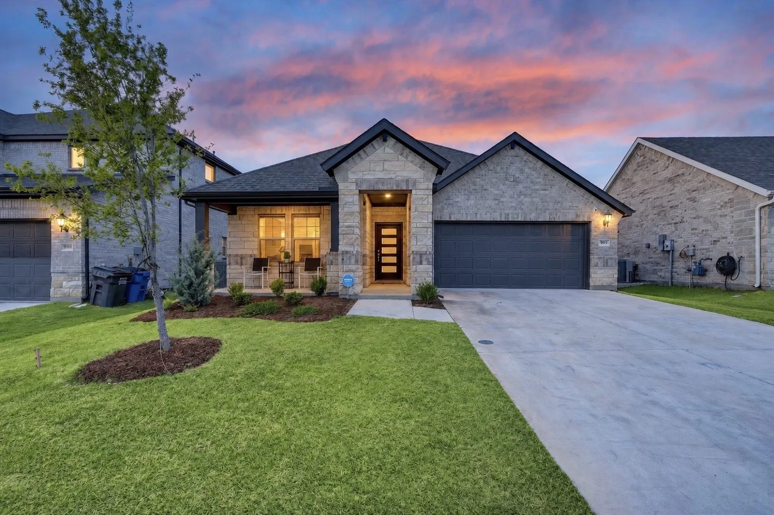 Stone and brick exterior with dark trim accents