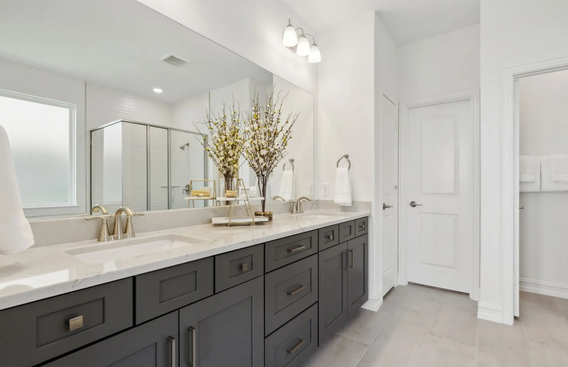 *Model Representation - Owner's private bath with double vanity