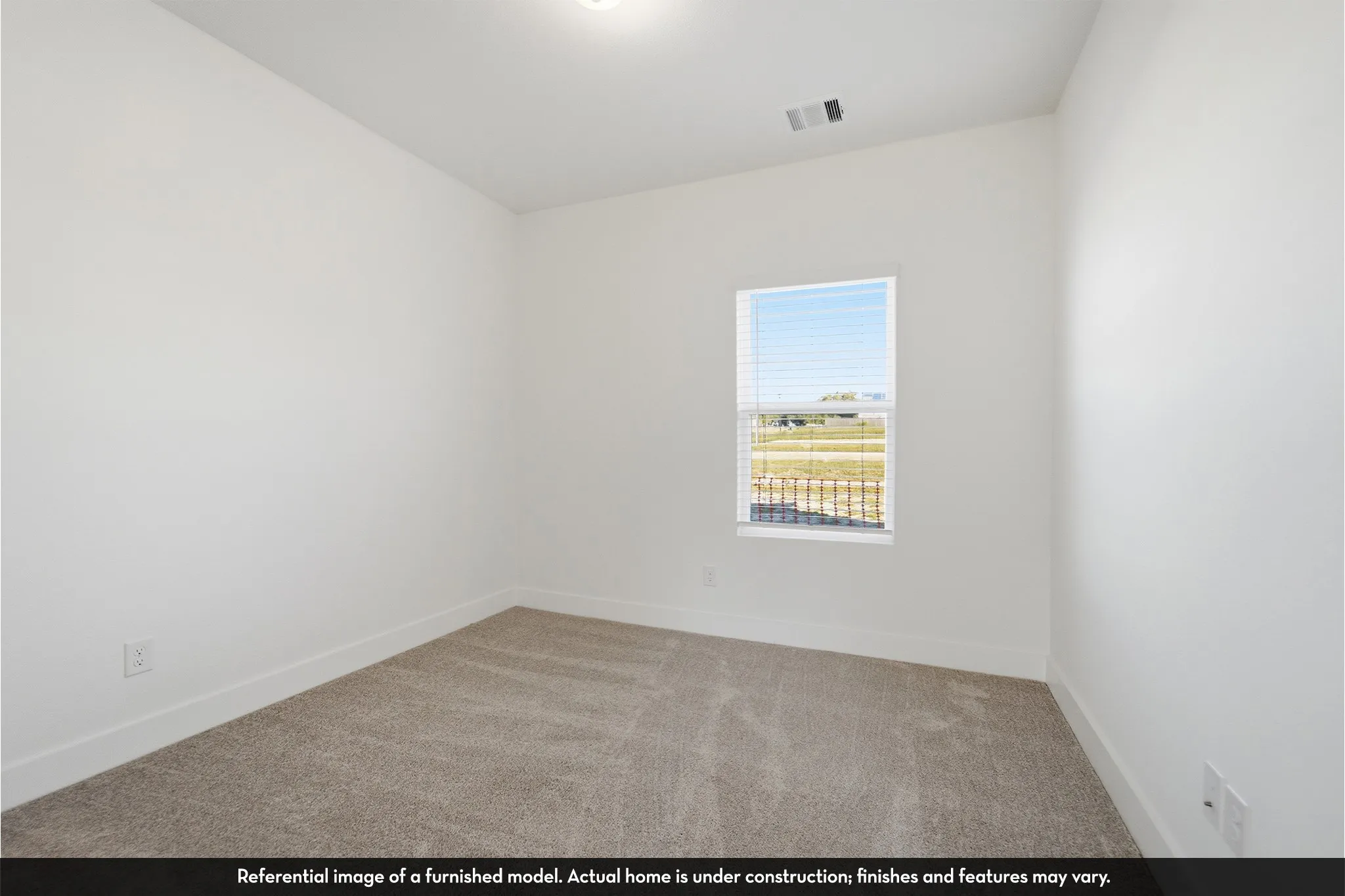 Neutral-toned wall-to-wall carpeting, crisp white walls, and a single-pane window with installed blinds