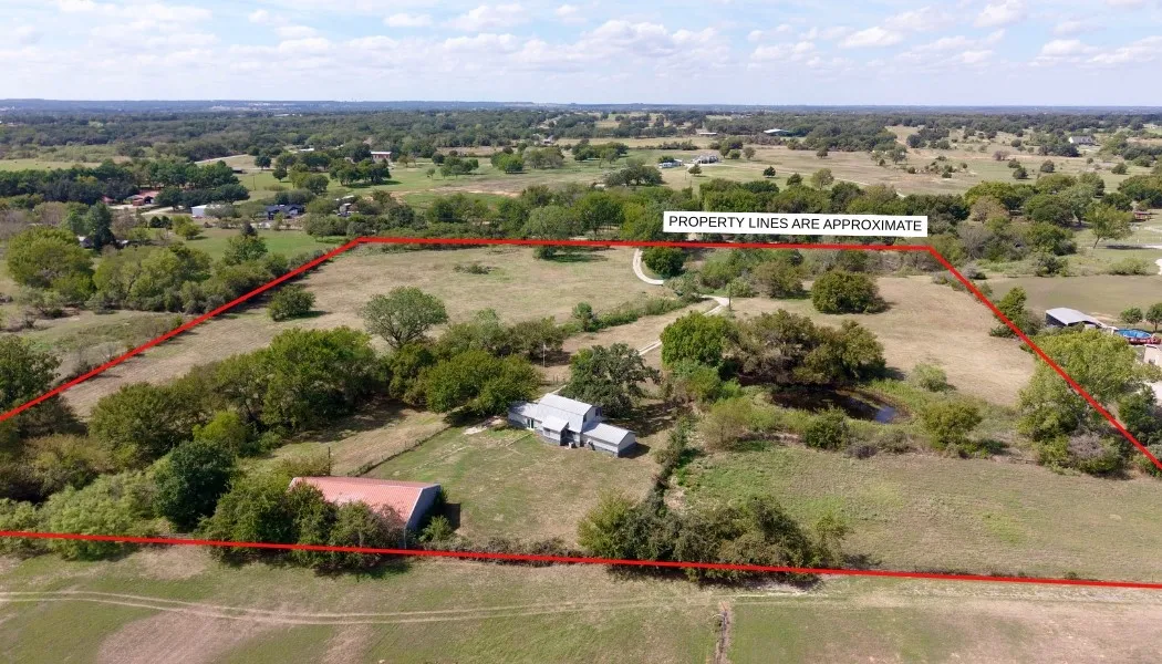 Expansive undeveloped land with scattered mature trees