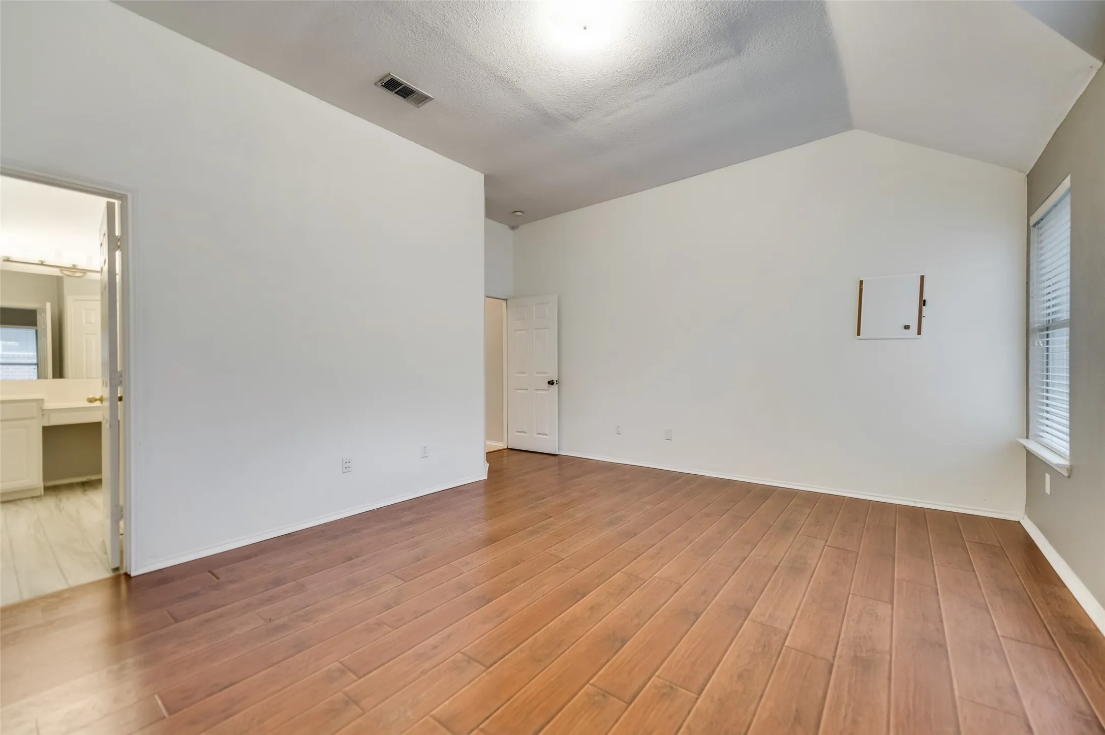 Master bedroom with attached bathroom
